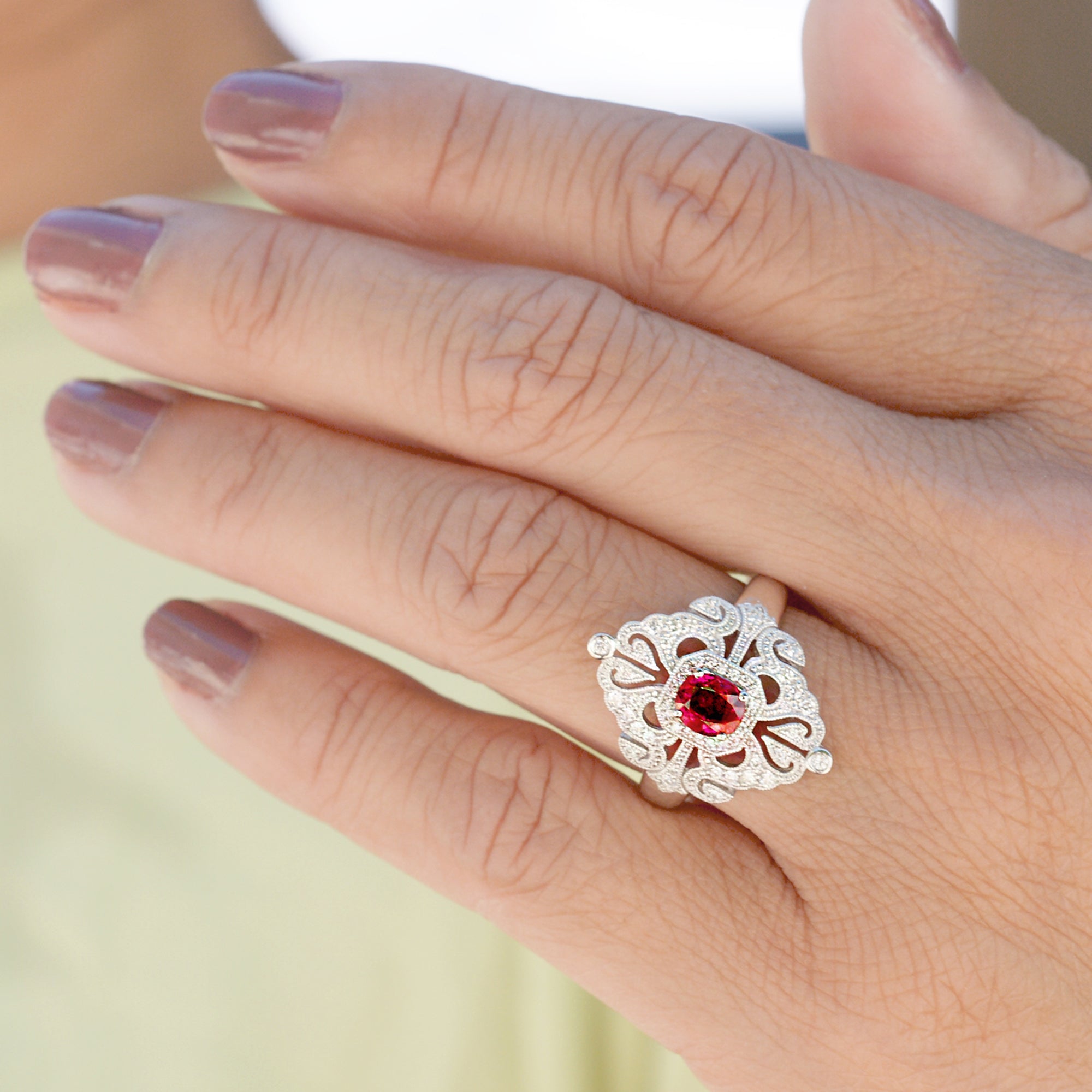 Oval ruby and diamond vintage design ring