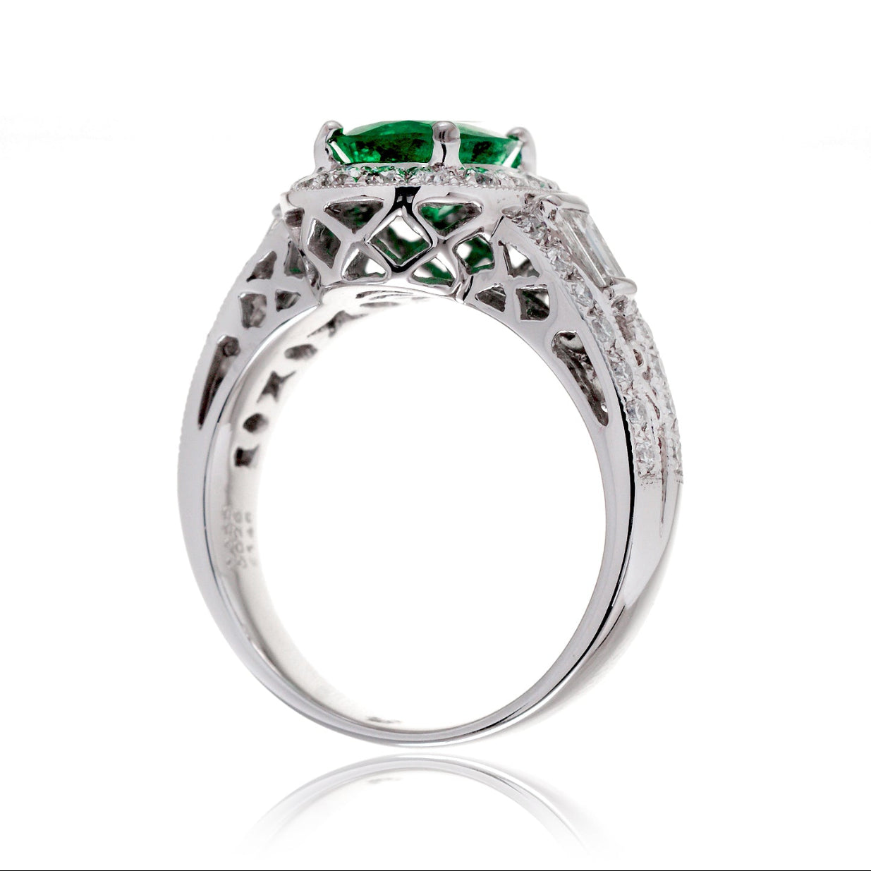 Emerald ring vintage style halo with milgrain and baguette on wide band in white gold