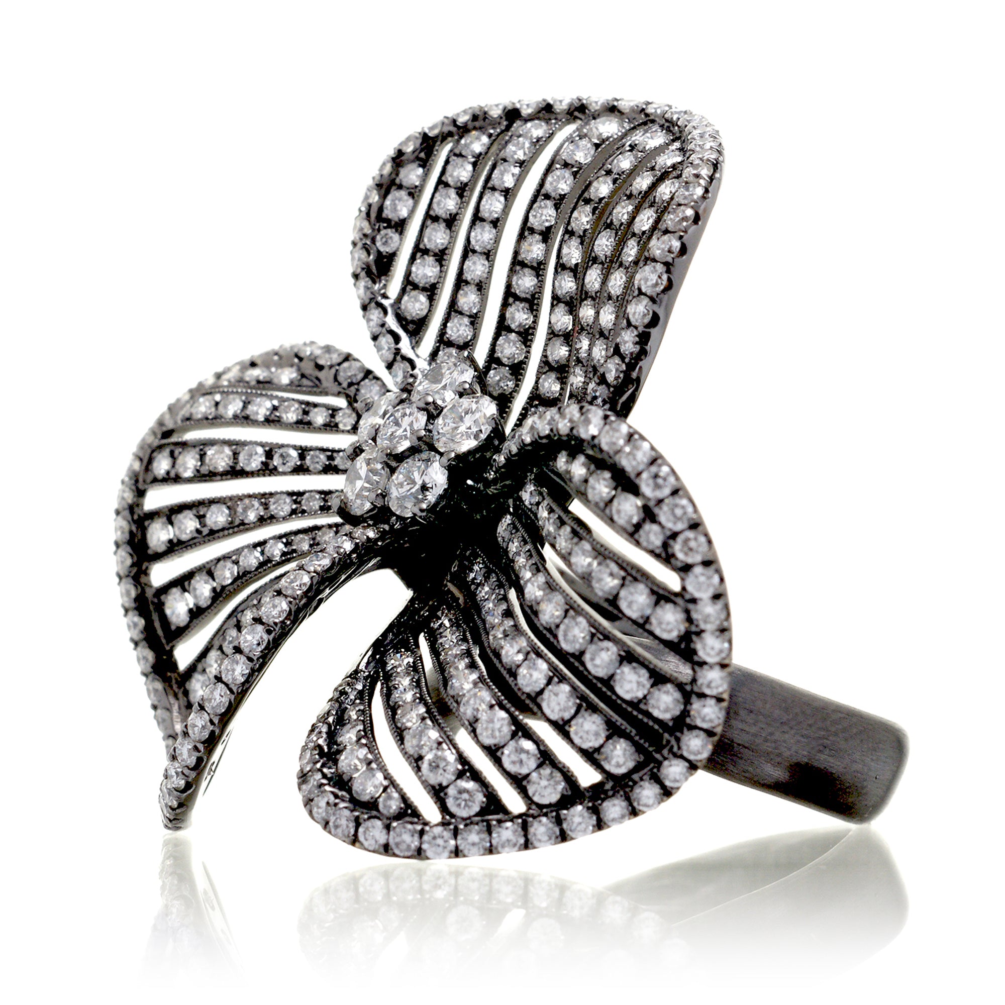 Three petal flower diamond ring cocktail with black rhodium in white gold
