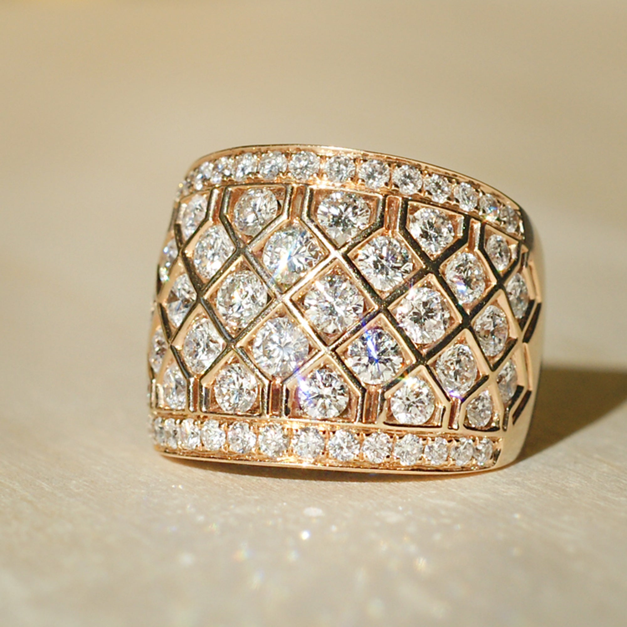 Large cocktail diamond band with pineapple pattern in rose gold