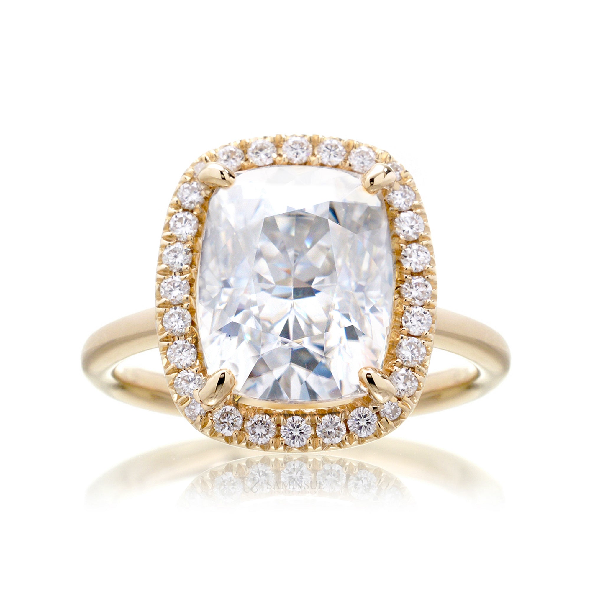 Cushion moissanite and diamond halo ring with a solid band in yellow gold - the drenched