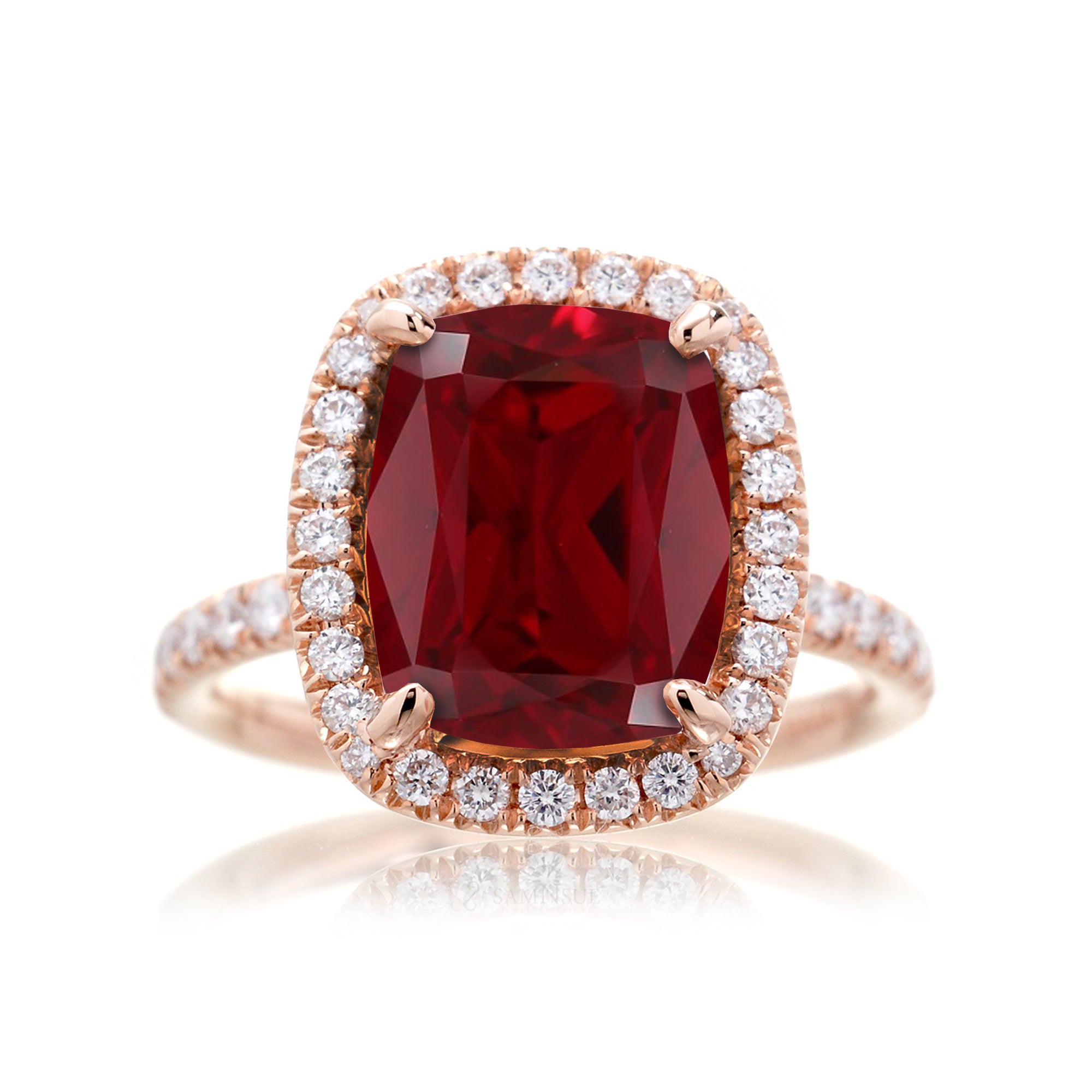 Ruby engagement ring with diamond halo The Drenched Cushion rose gold
