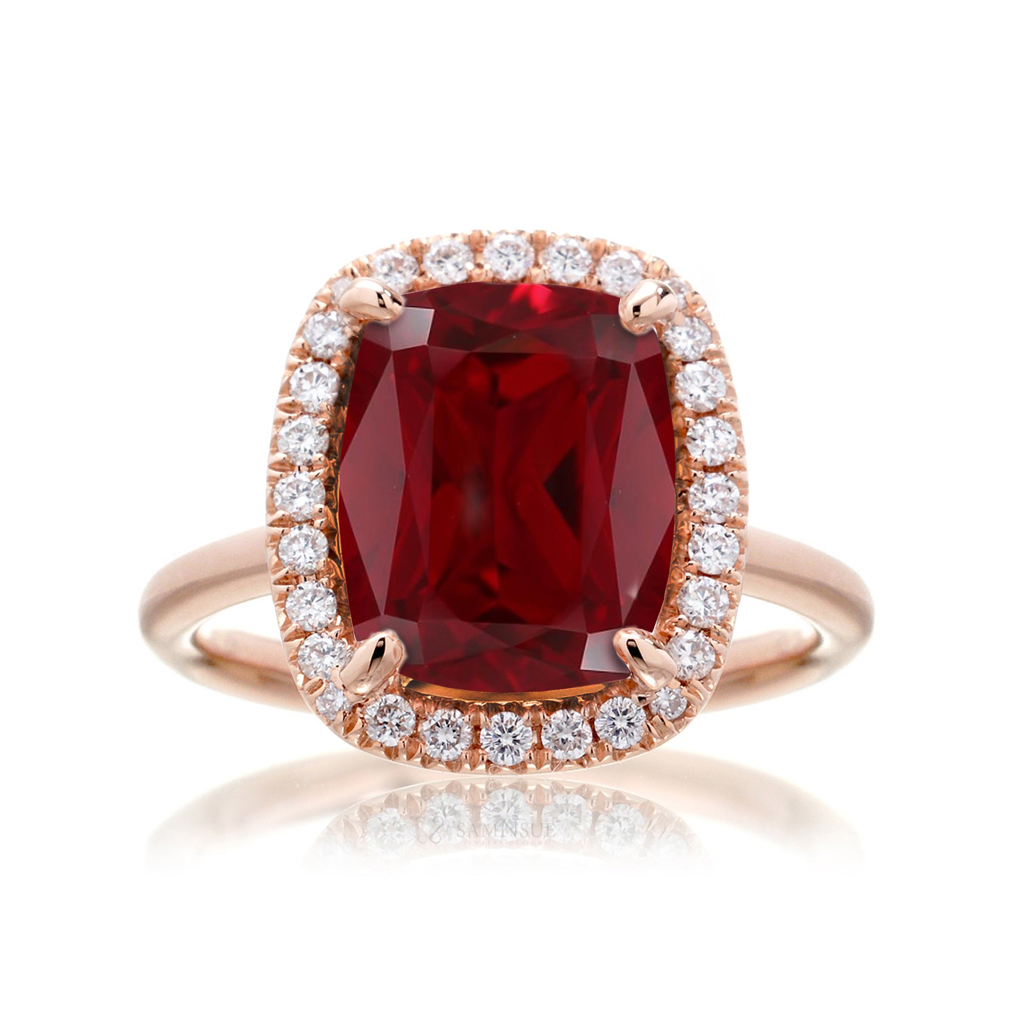 Ruby engagement ring with diamond halo The Drenched Cushion rose gold solid band