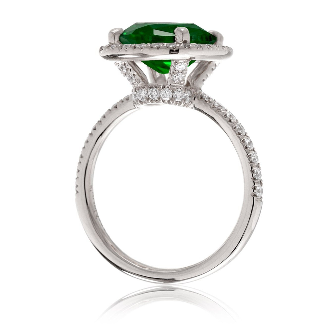 Green emerald engagement ring with emerald cut center stone diamond halo the Drenched white gold