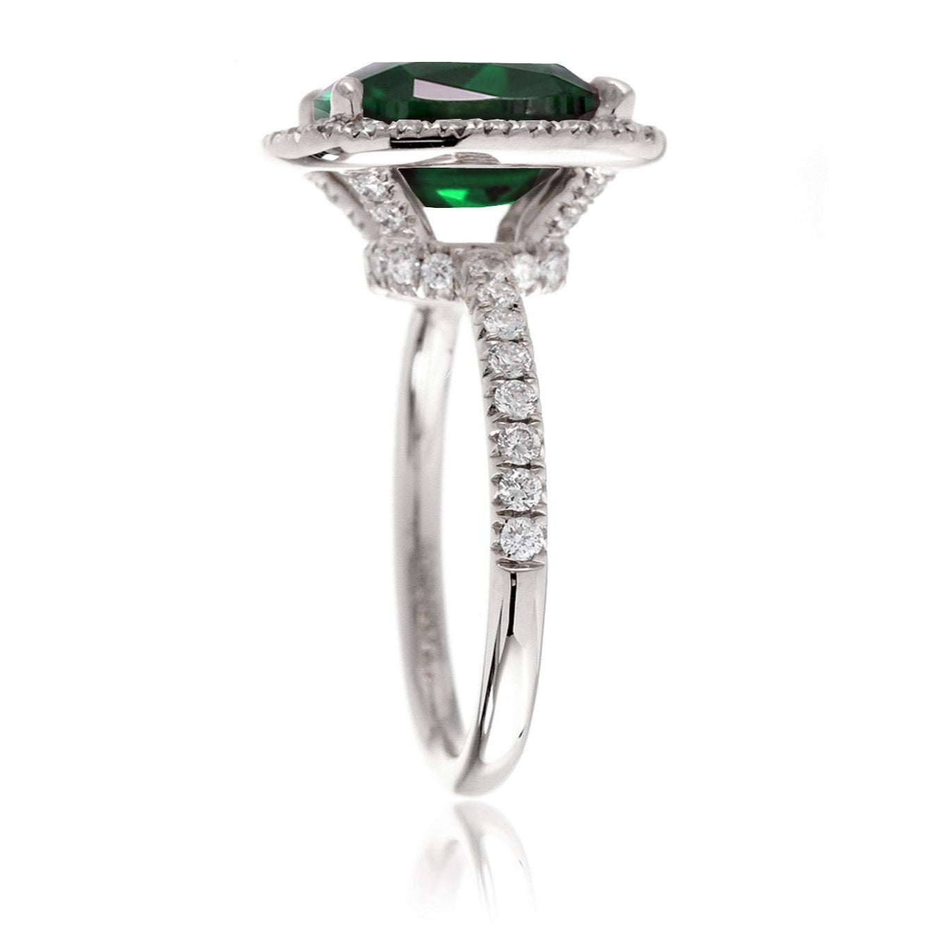 Green emerald engagement ring with emerald cut center stone diamond halo the Drenched white gold