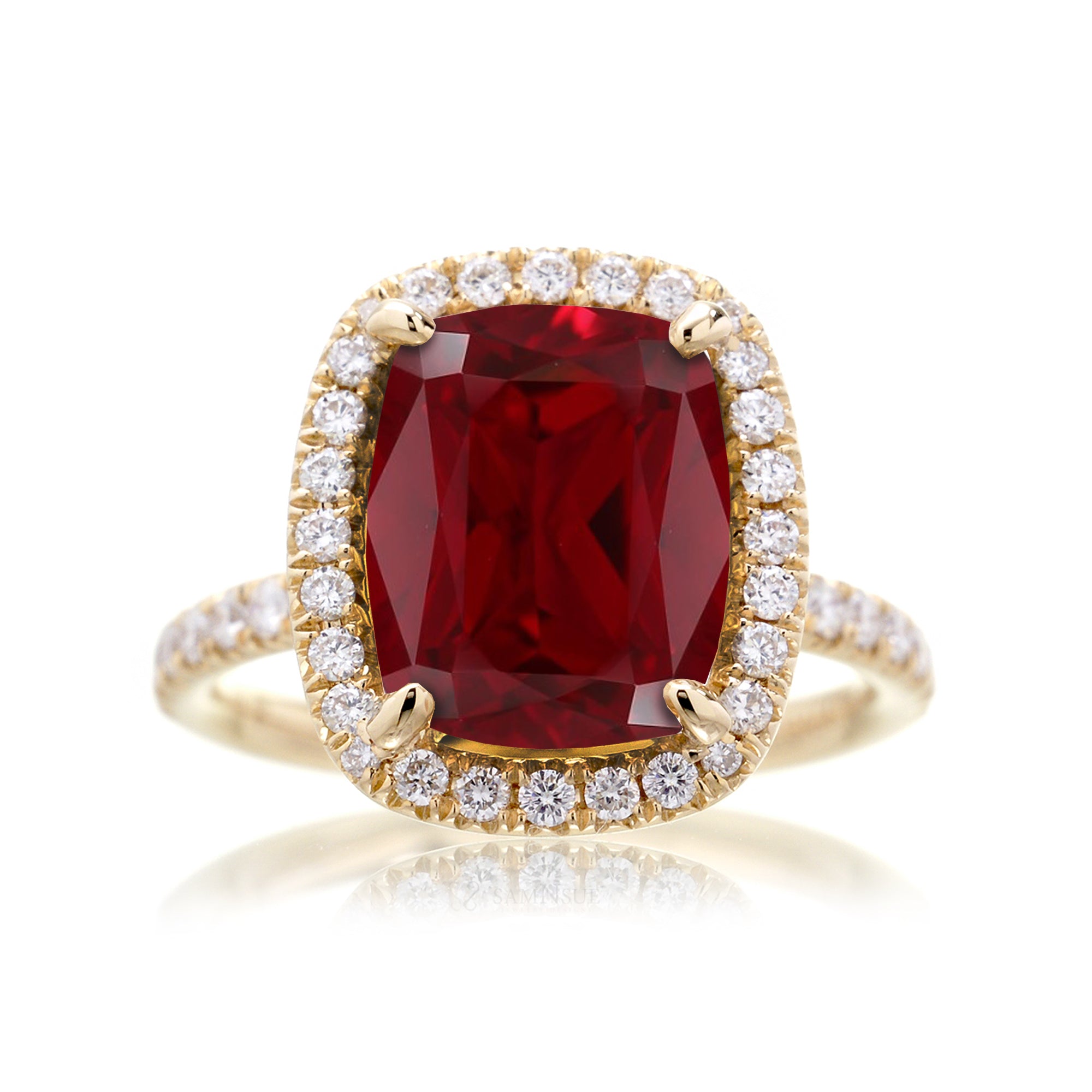Ruby engagement ring with diamond halo The Drenched Cushion yellow gold