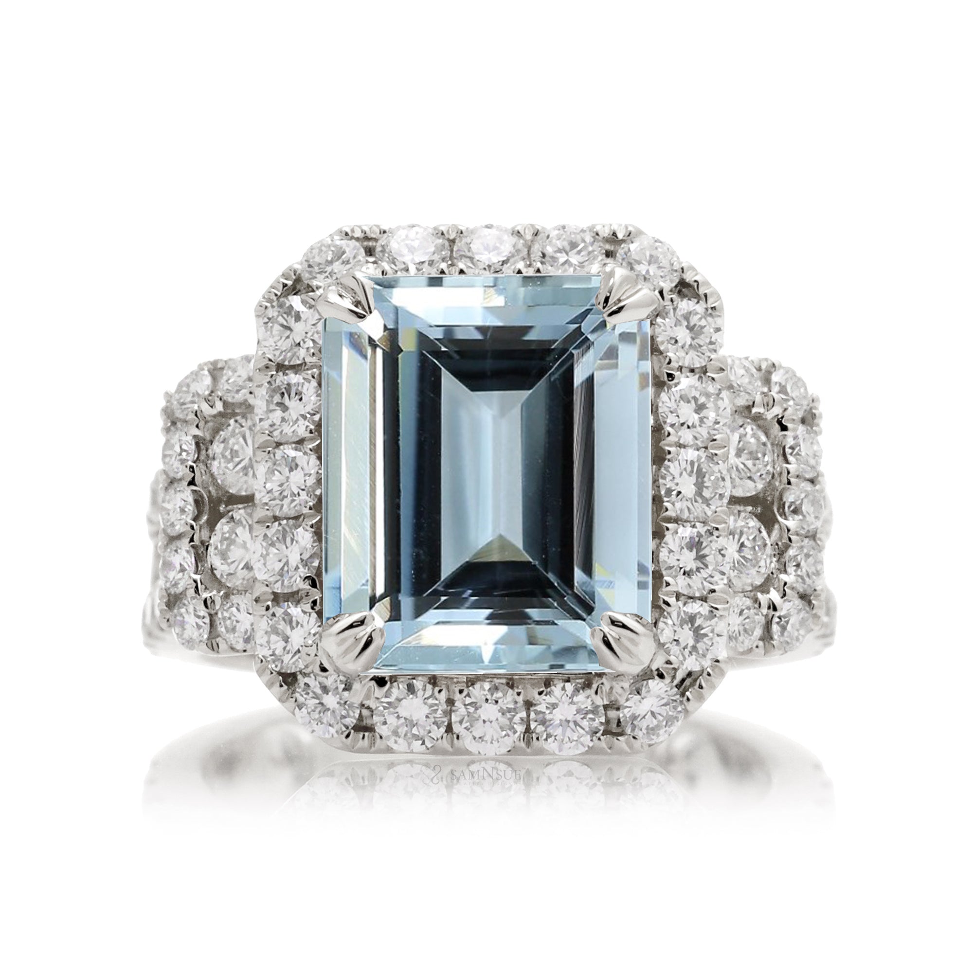 Emerald cut aquamarine with diamond halo and three stone bold wide setting engagement anniversary ring in white gold