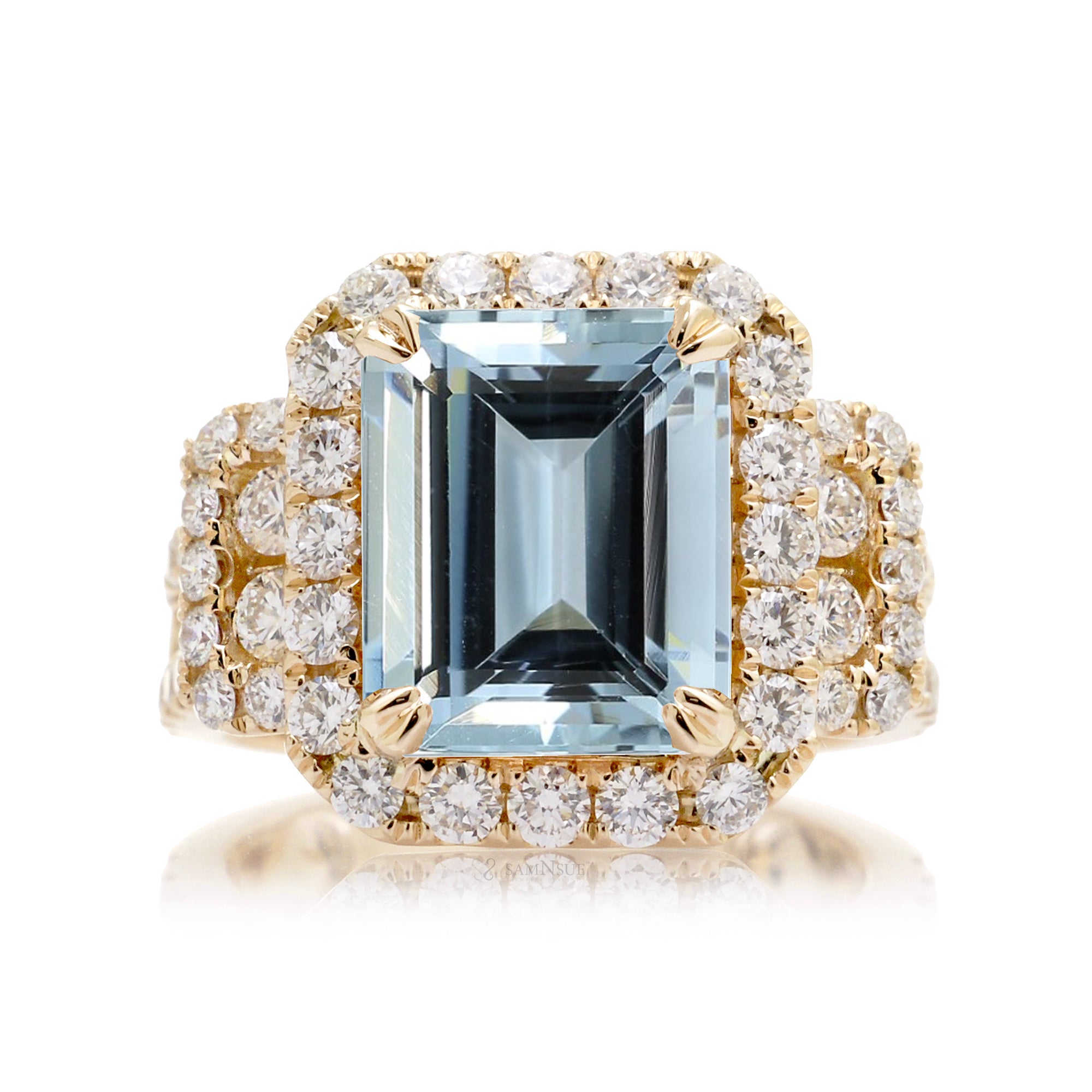 Emerald cut aquamarine with diamond halo and three stone bold wide setting engagement anniversary ring in yellow gold