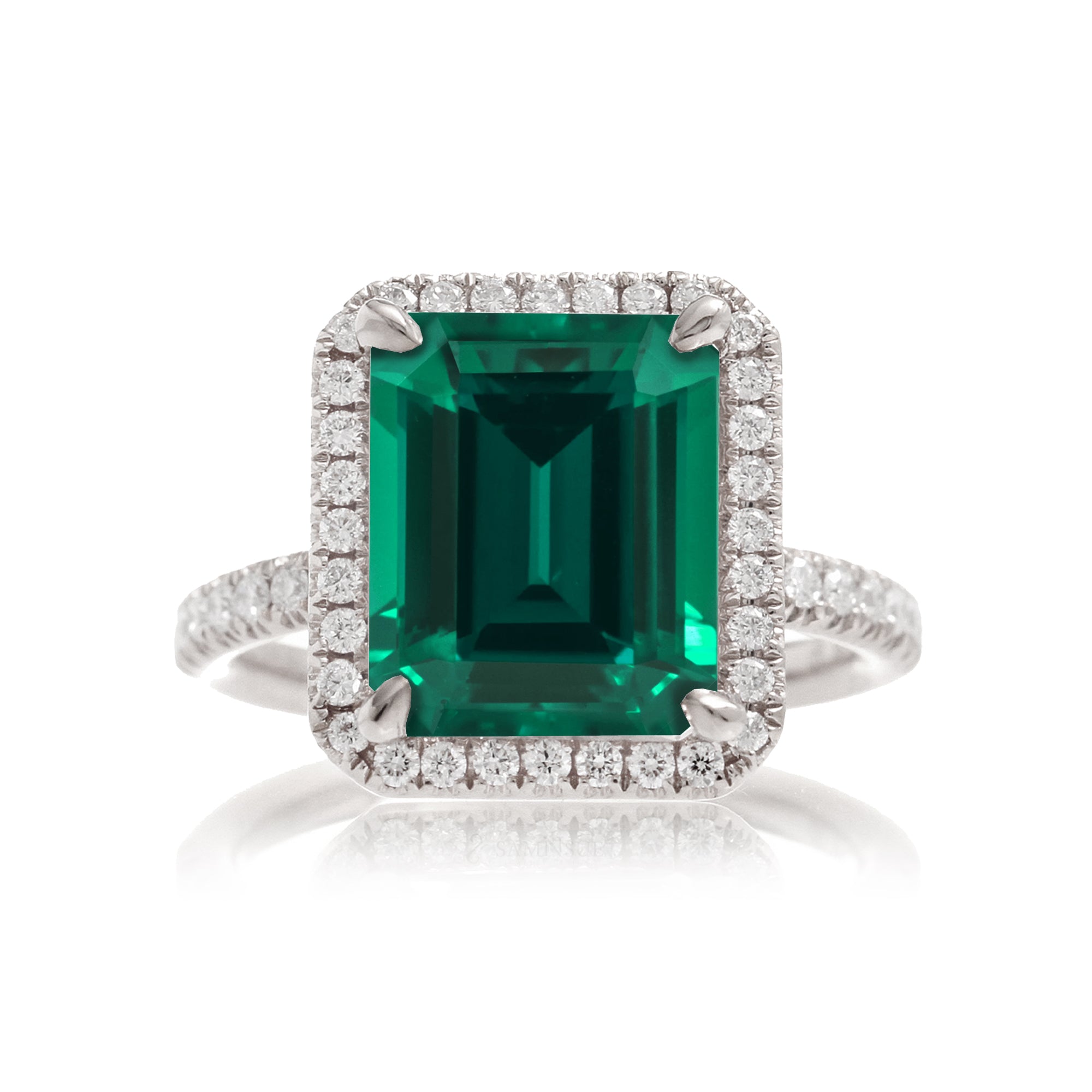 Green emerald engagement ring with emerald cut center stone diamond halo the Drenched white gold