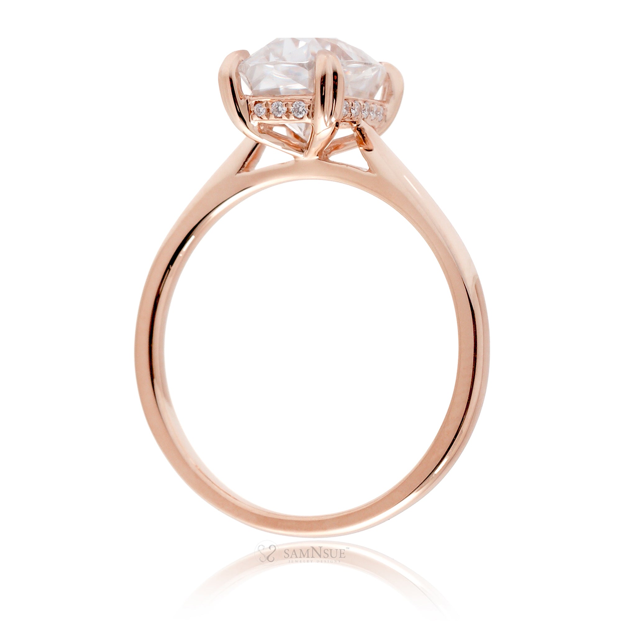 Cushion moissanite solitaire engagement ring in rose gold and solid band