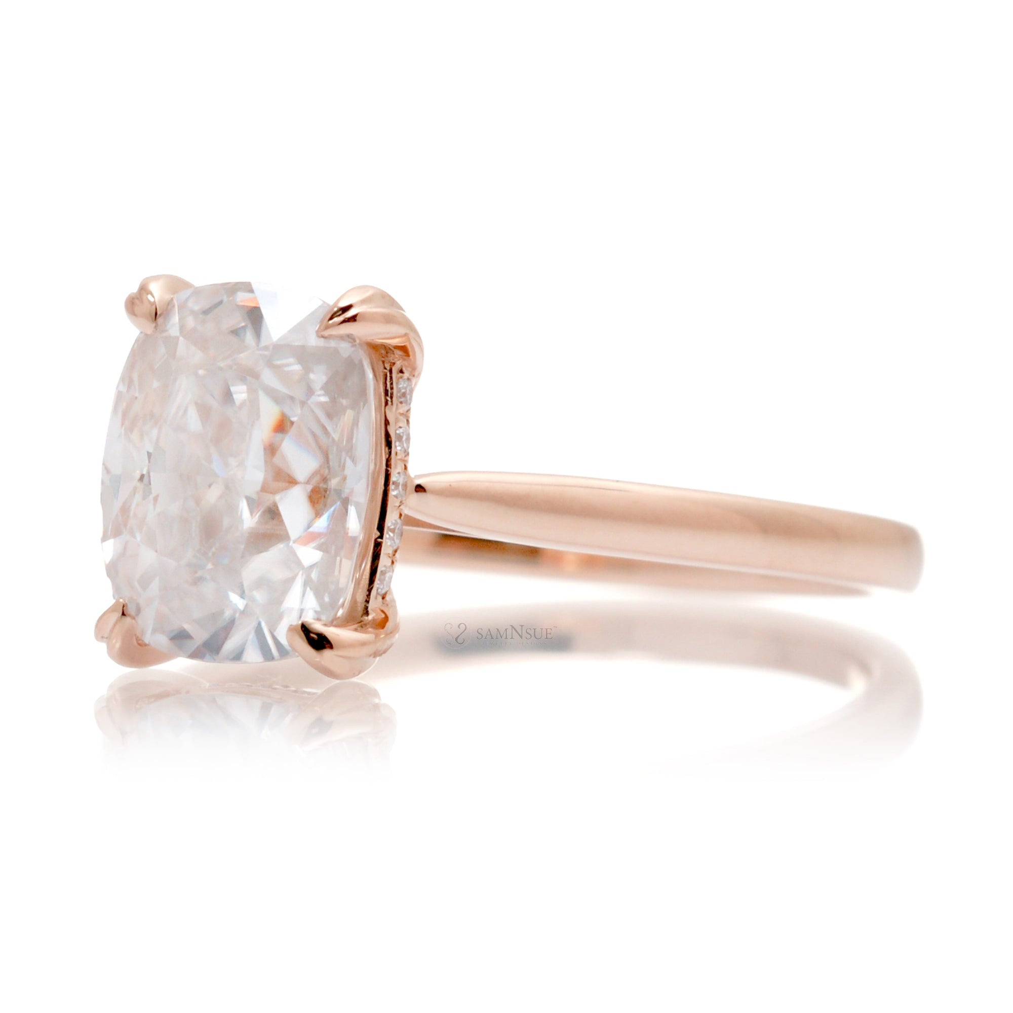 Cushion moissanite solitaire engagement ring in rose gold and solid band