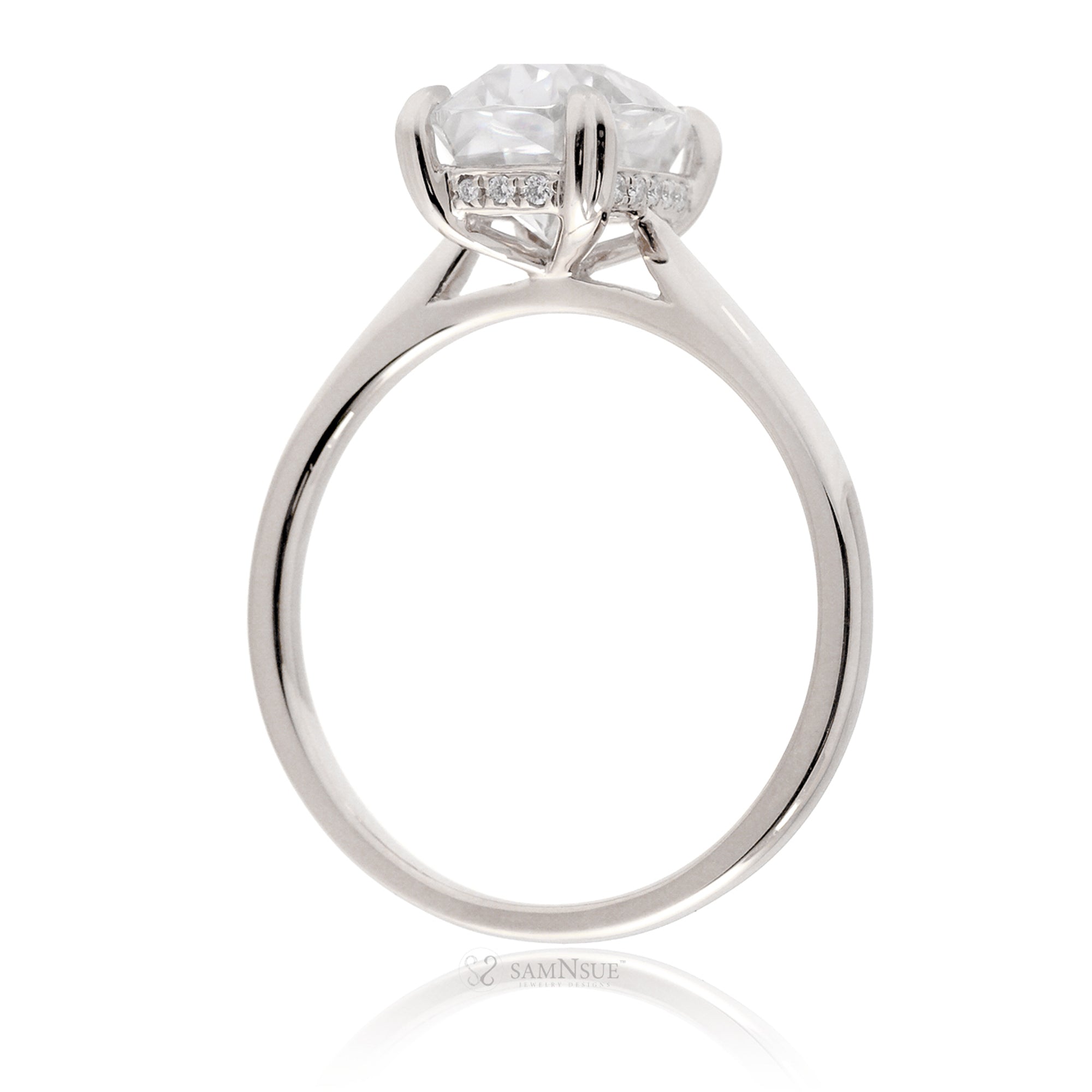 Cushion moissanite solitaire engagement ring in white gold and solid band