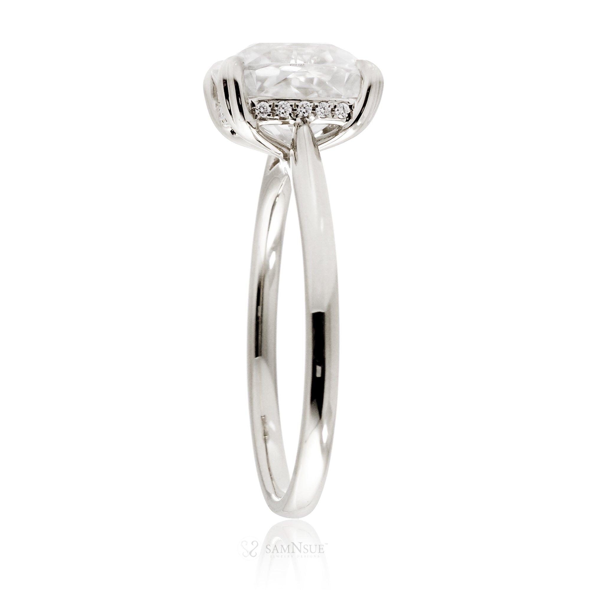 Cushion moissanite solitaire engagement ring in white gold and solid band