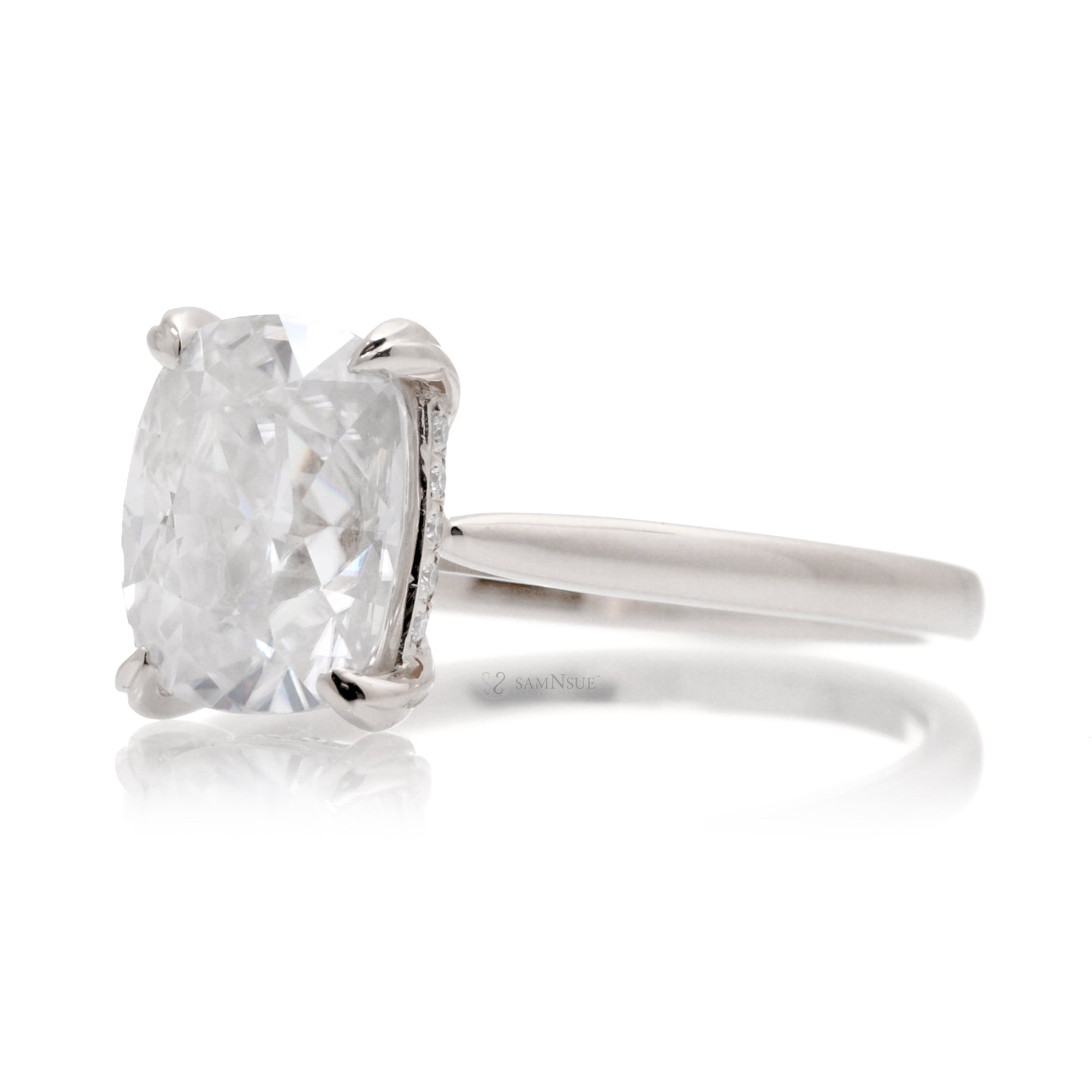 Cushion moissanite solitaire engagement ring in white gold and solid band