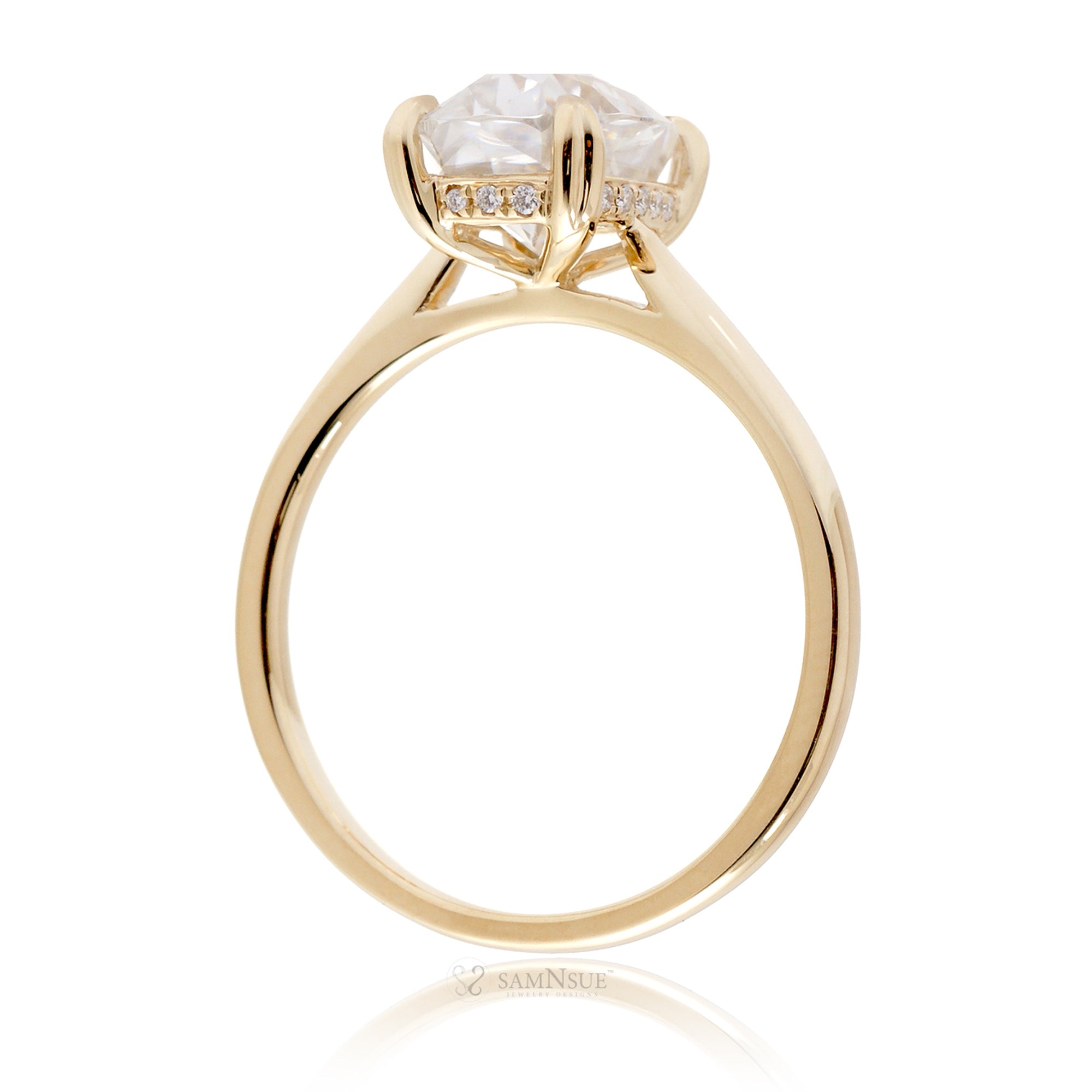 Cushion moissanite solitaire engagement ring in yellow gold and solid band