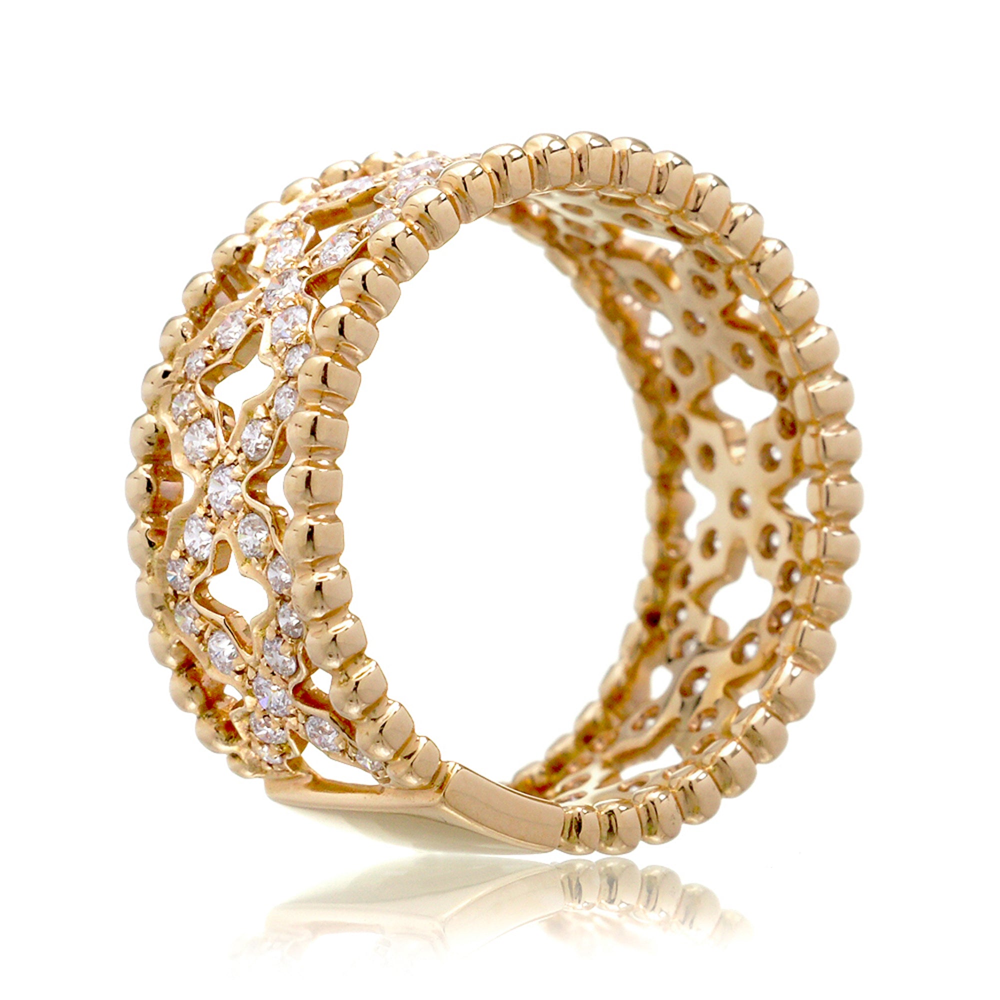 Diamond eternity band in yellow gold with beads and criss cross clover pattern