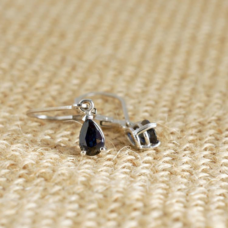 Pear blue sapphire teardrop dangle earrings in white gold