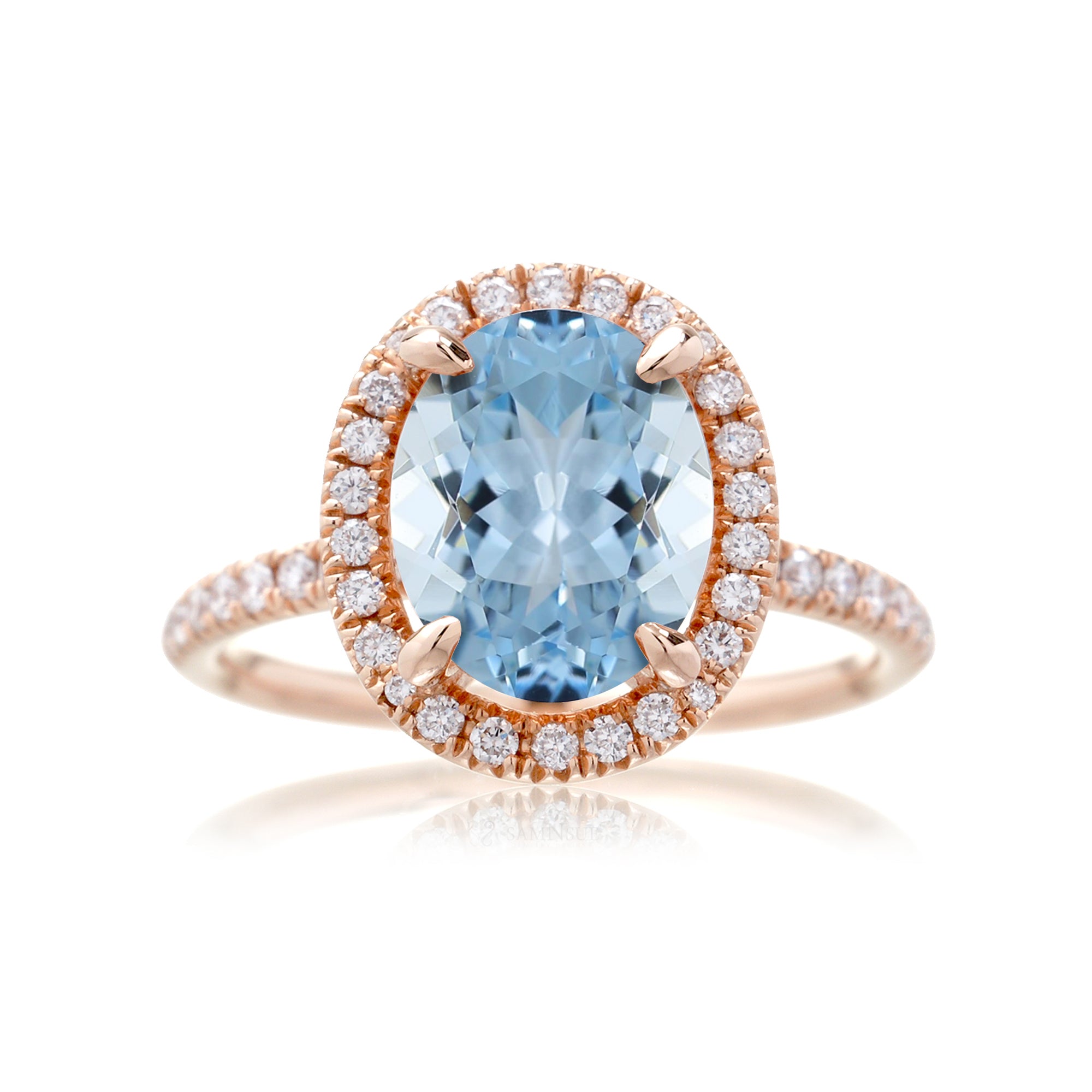 Oval aquamarine engagement ring with diamond halo the Drenched rose gold
