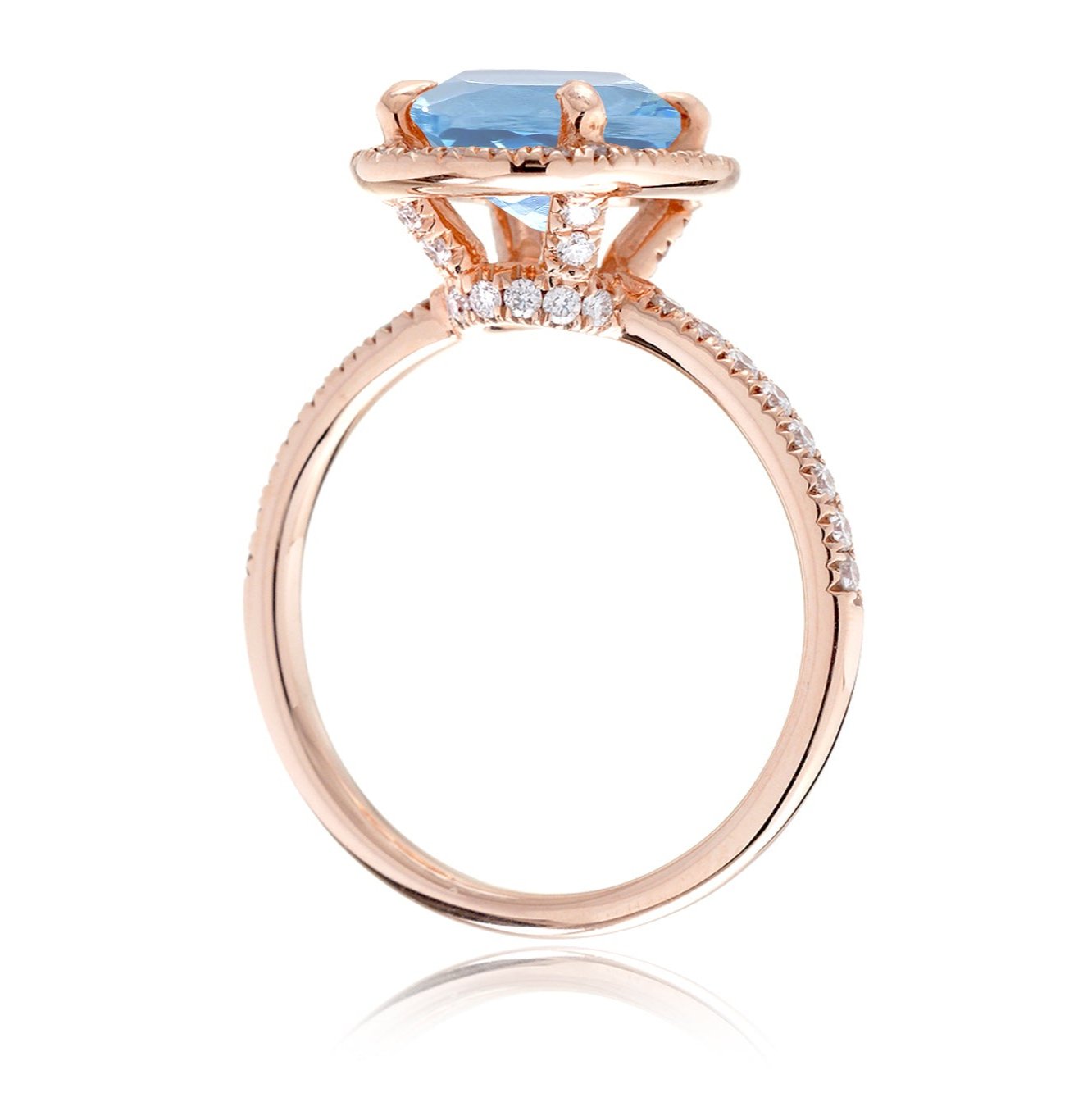 Oval aquamarine engagement ring with diamond halo the Drenched rose gold side view