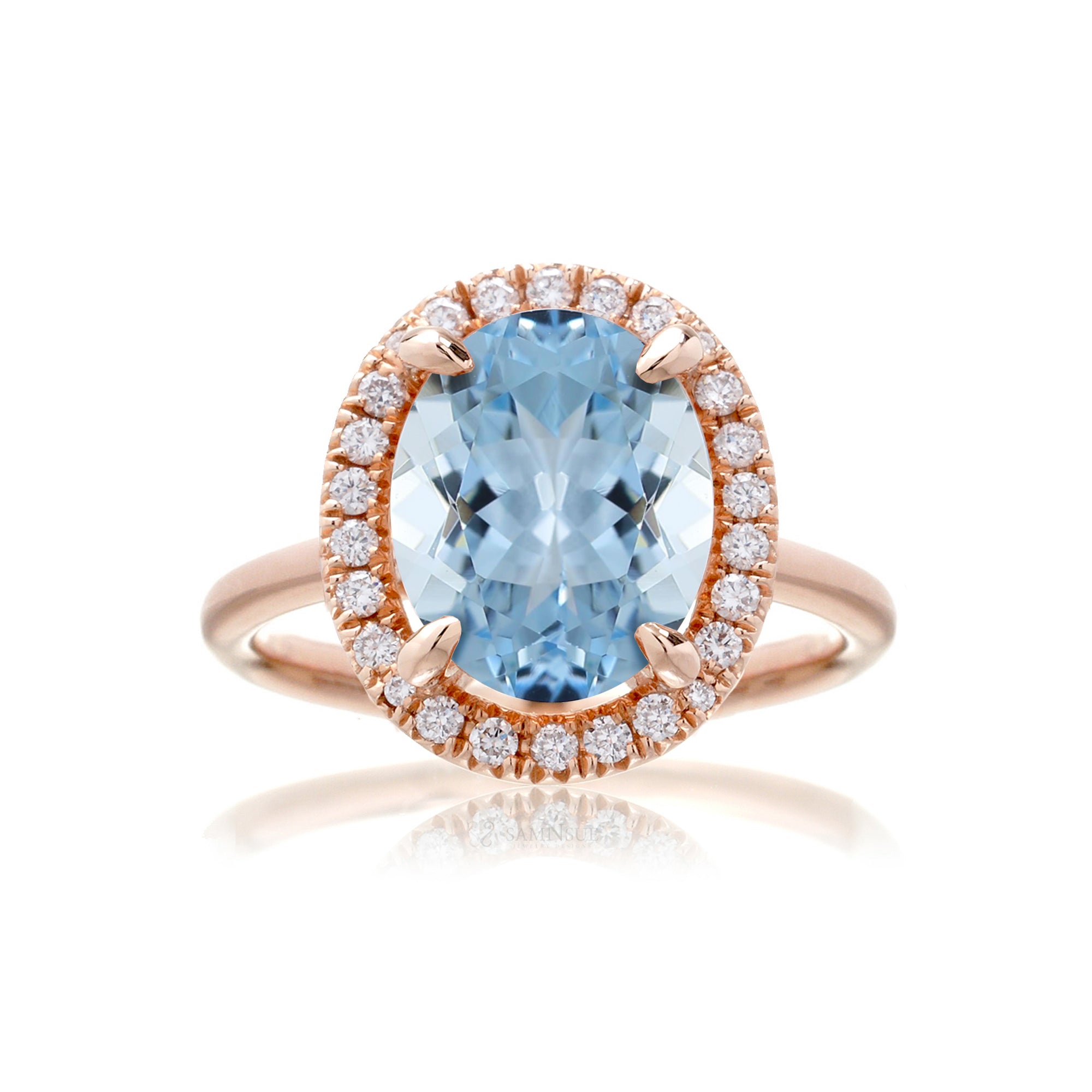 Oval aquamarine engagement ring with diamond halo the Drenched rose gold solid band