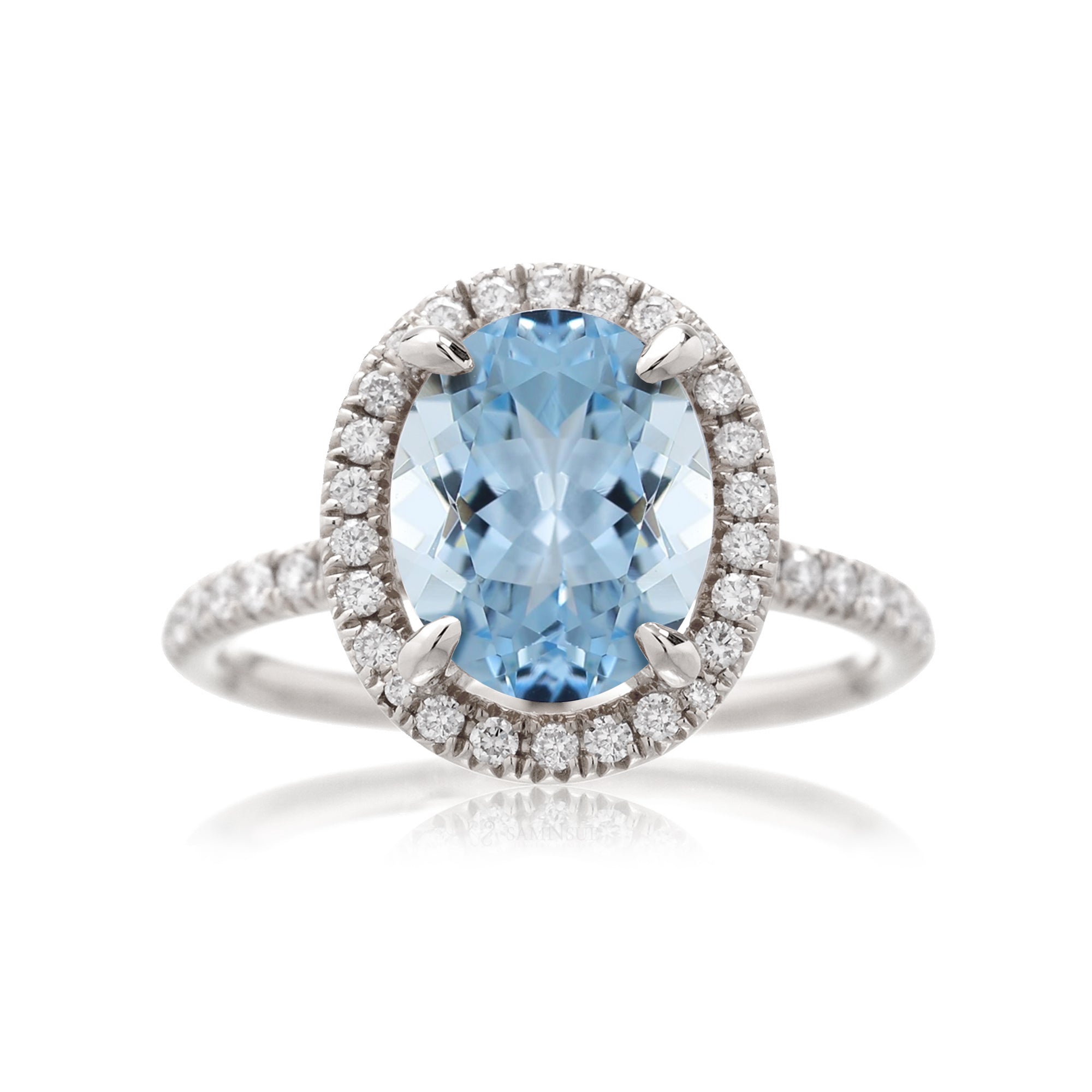 Oval aquamarine engagement ring with diamond halo the Drenched white gold