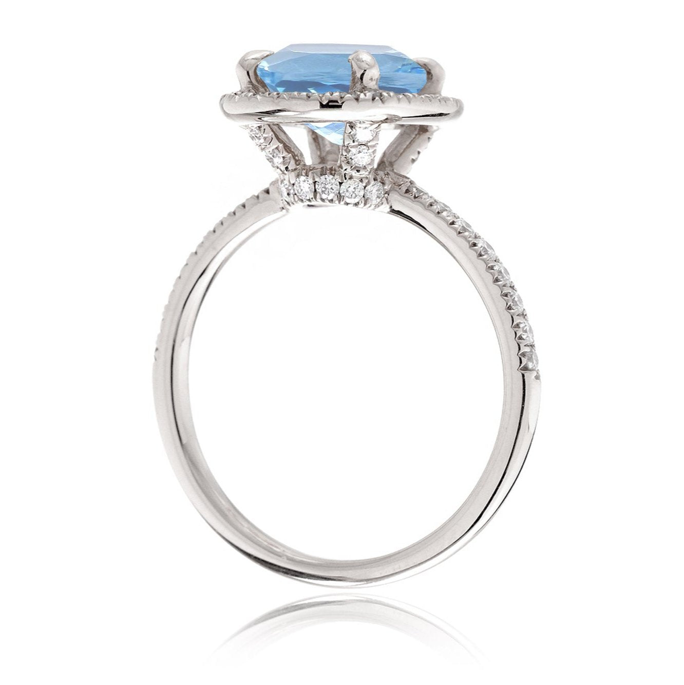 Oval aquamarine engagement ring with diamond halo the Drenched white gold side view