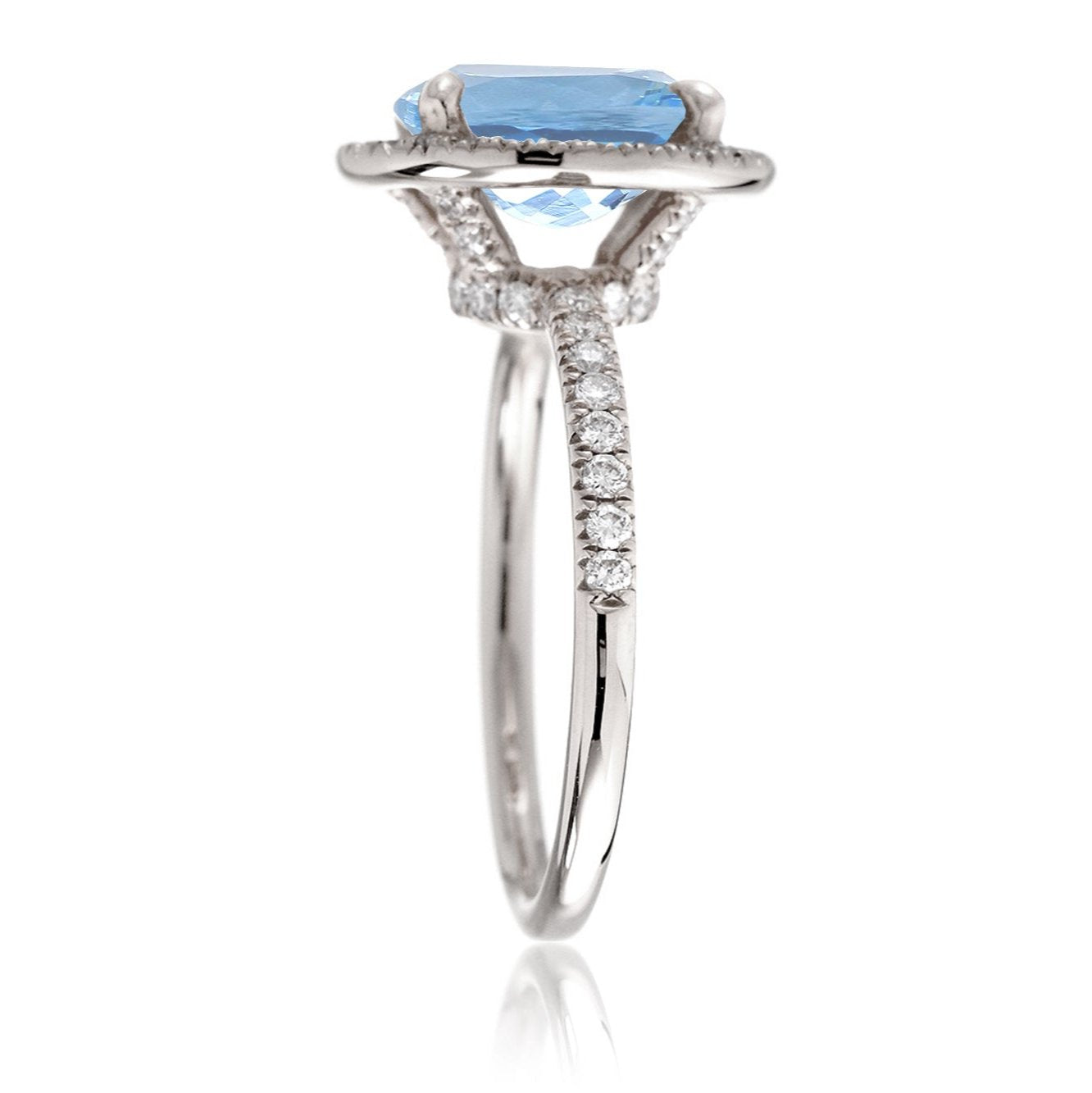 Oval aquamarine engagement ring with diamond halo the Drenched white gold profile view