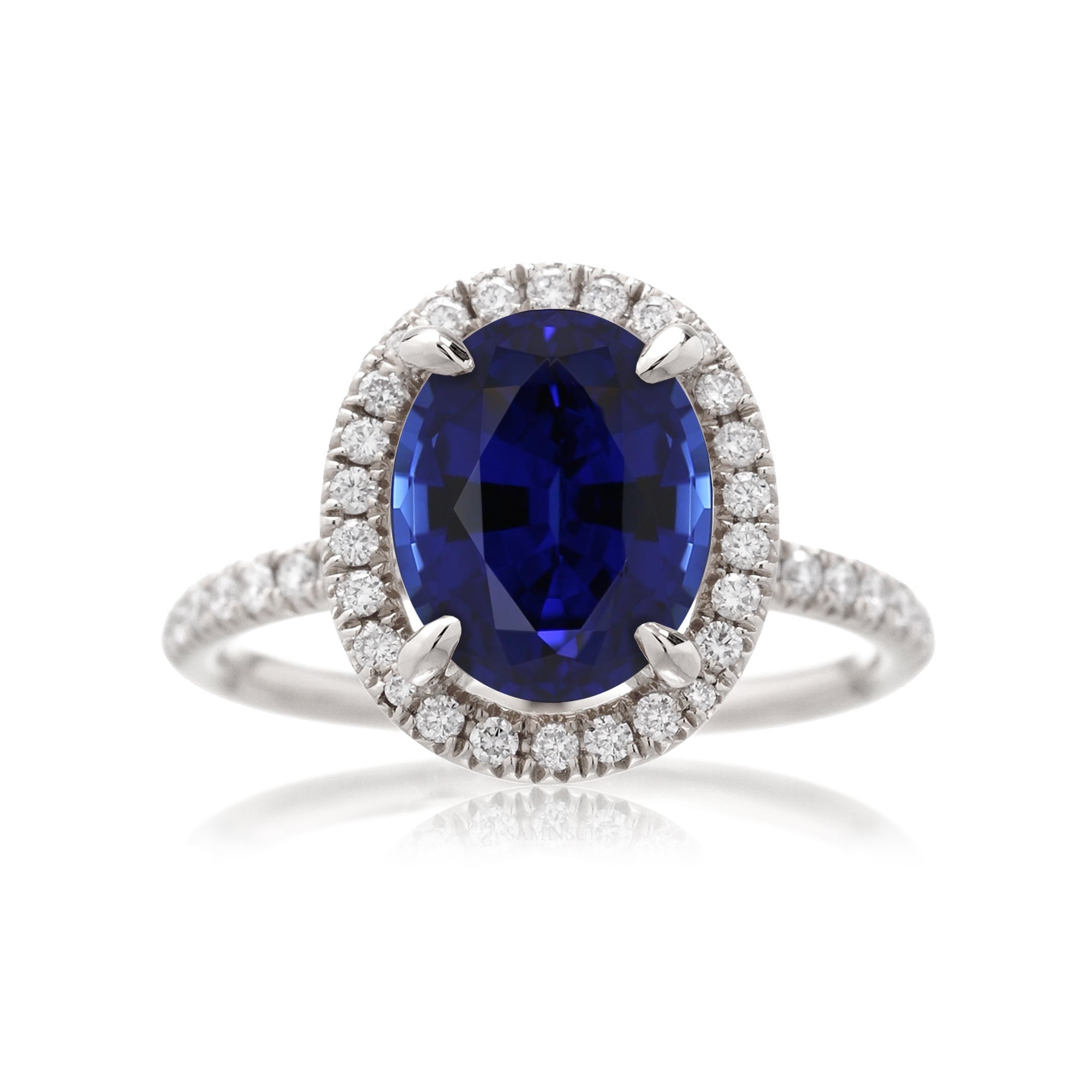 Oval Blue Sapphire Engagement Ring With A Diamond Halo The Drenched