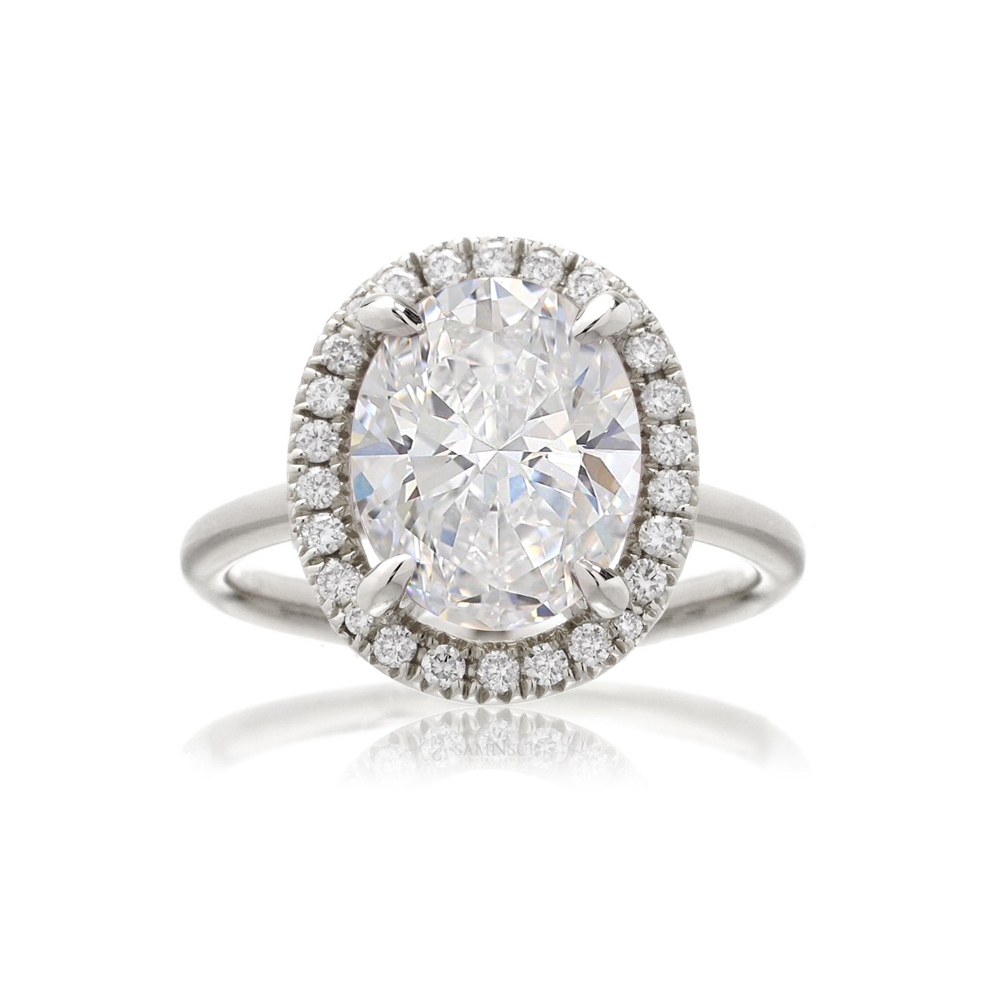 Oval brilliant cut diamond engagement ring the Drenched white gold solid band