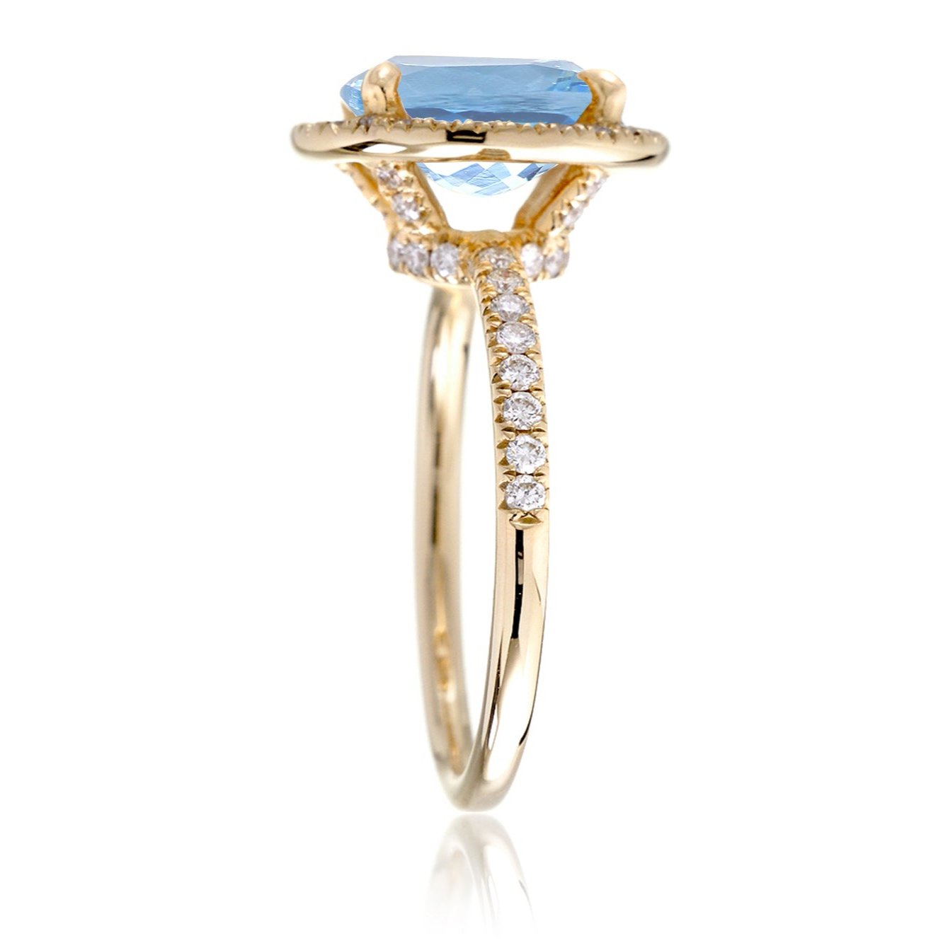 Oval aquamarine engagement ring with diamond halo the Drenched yellow gold profile view