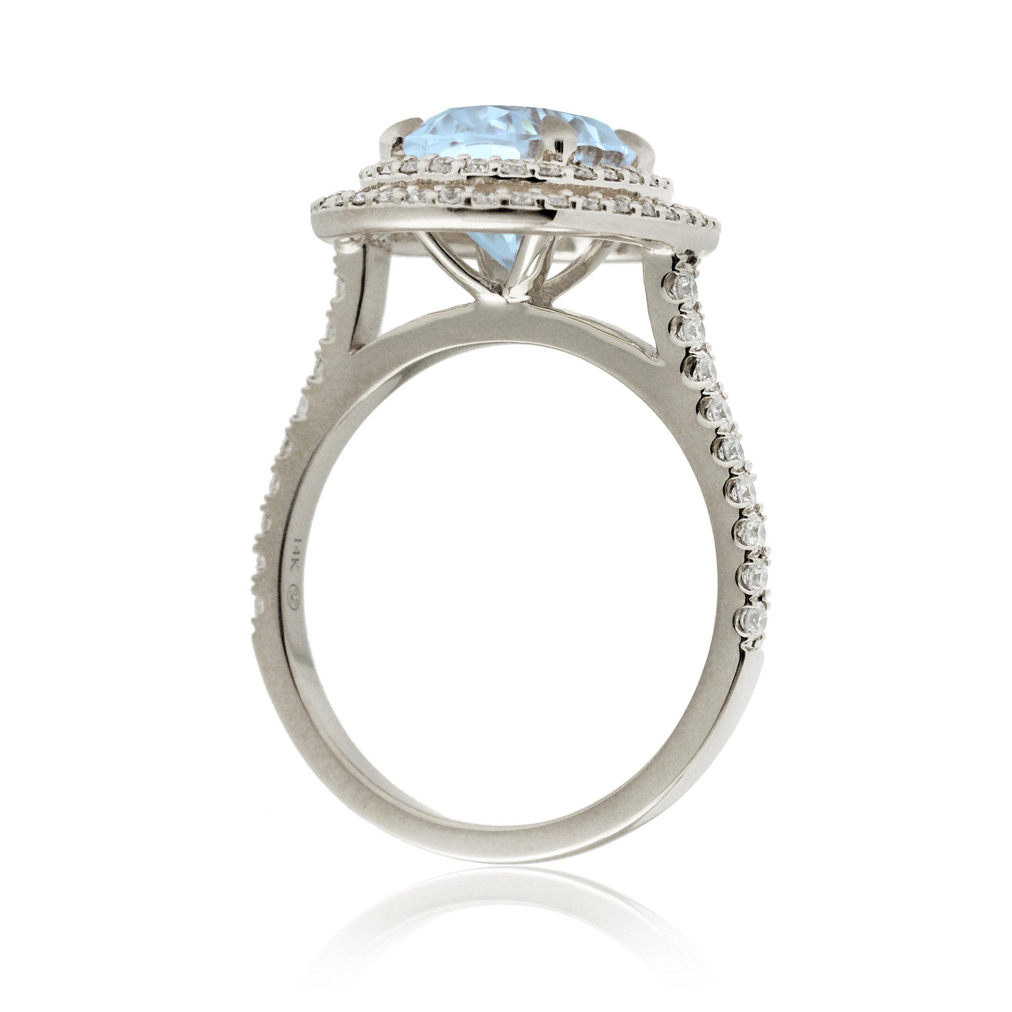 Oval cut aquamarine ring with double halo diamond band in white gold