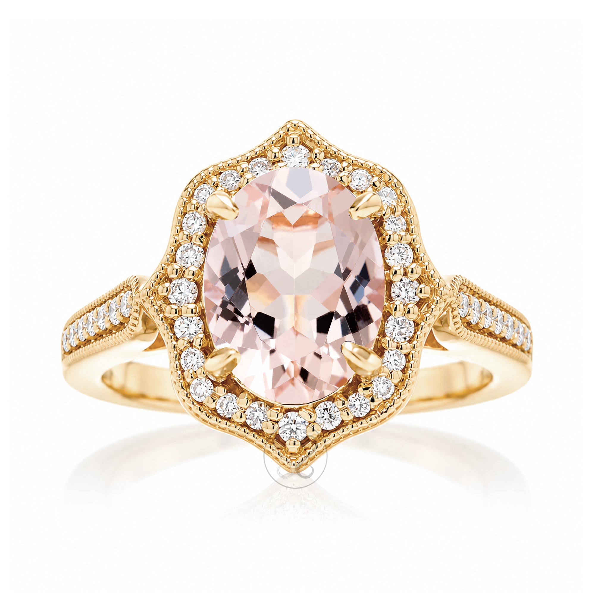 Vintage Oval Morganite and Diamond Halo Ring in Yellow Gold