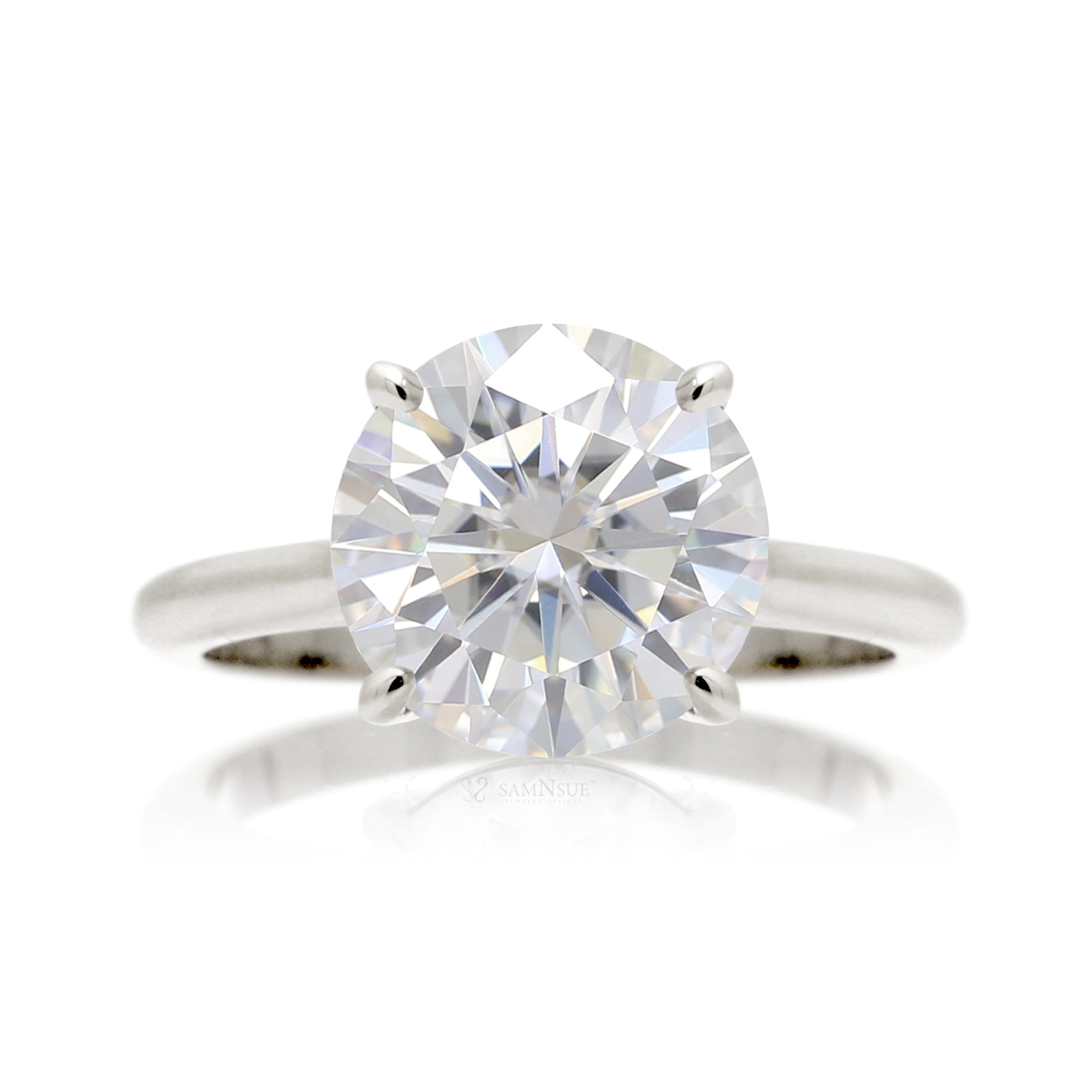 Round solitaire diamond engagement ring in white gold
