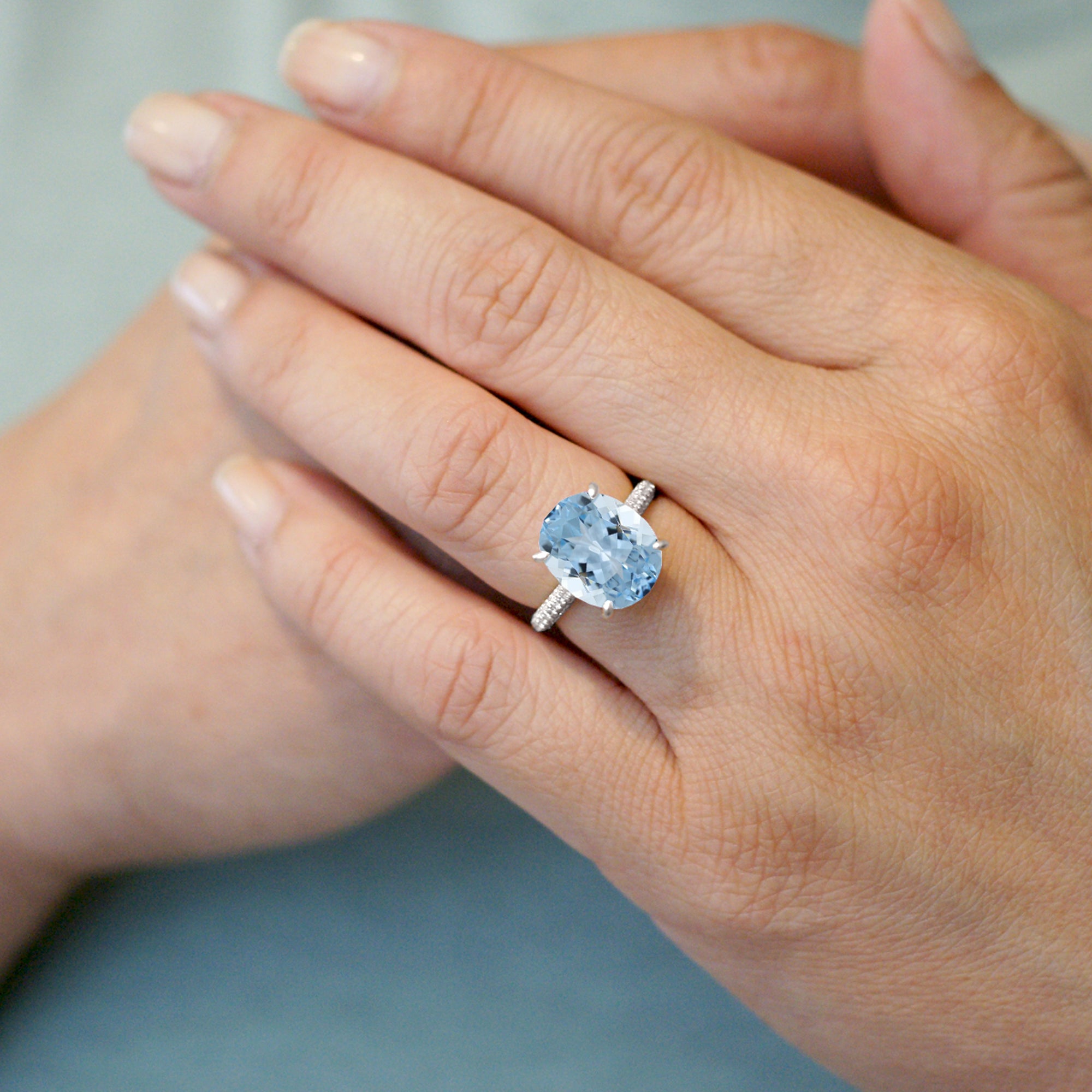 Oval cut aquamarine diamond solitaire pave engagement ring in white gold