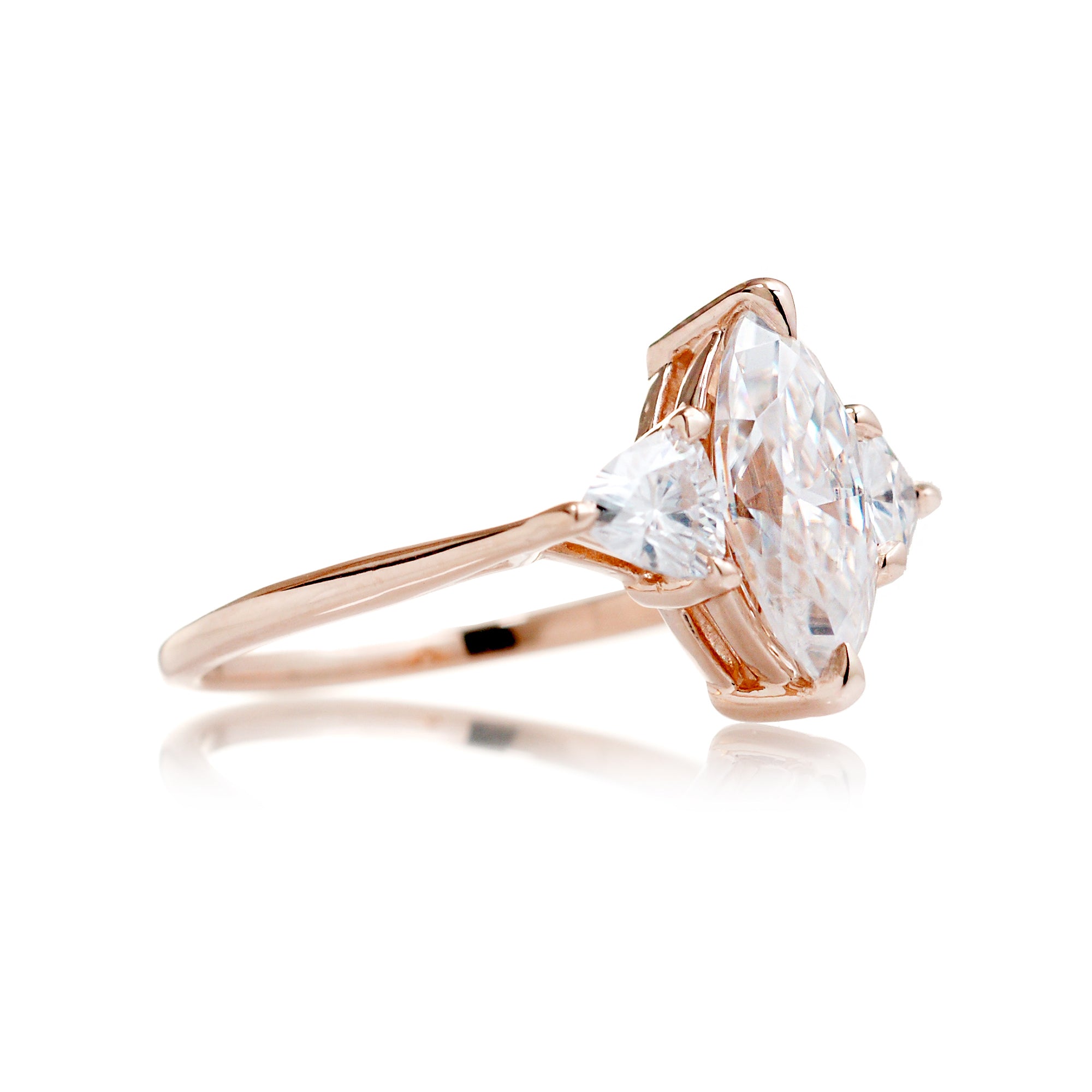 The Trillion Threestone Marquise Moissanite Ring