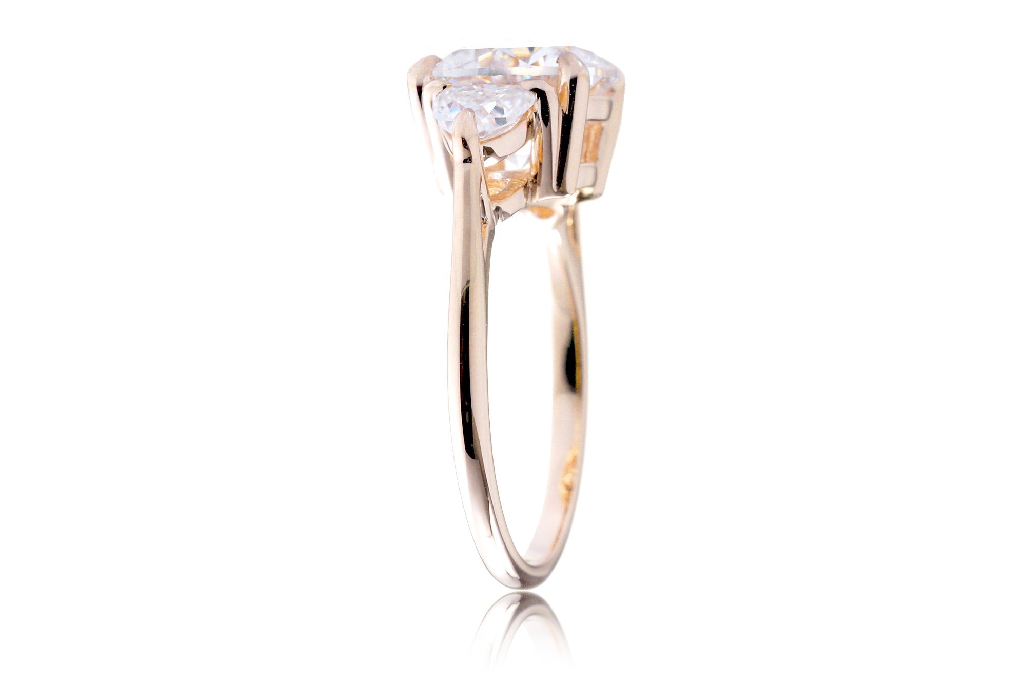 The Trillion Three stone Round Moissanite Ring
