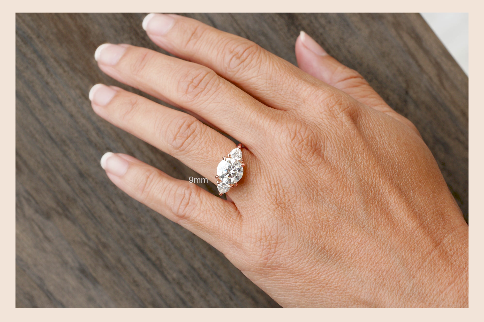 The Trillion Three stone Round Moissanite Ring