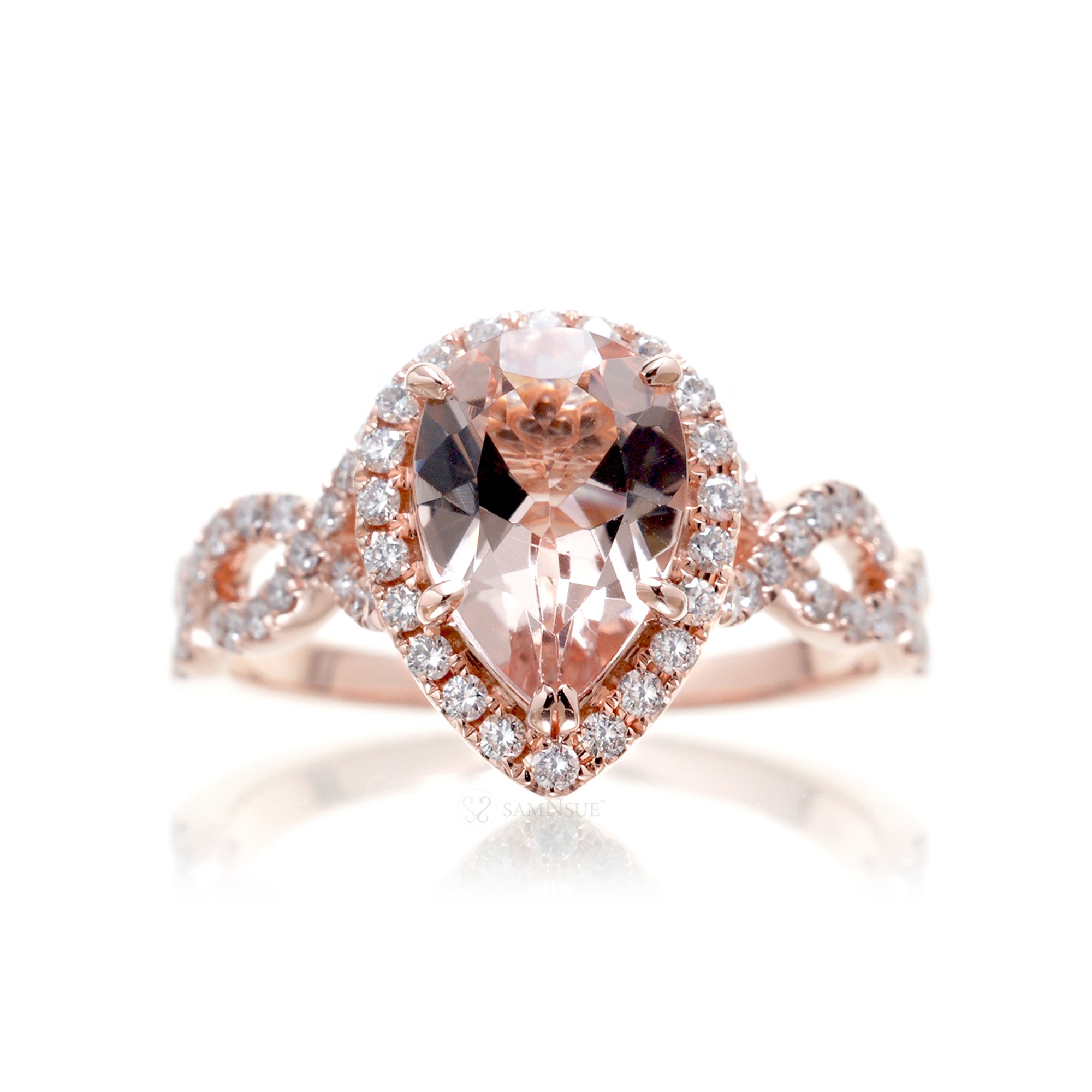 Pear morganite engagement ring rose gold diamond halo twist band