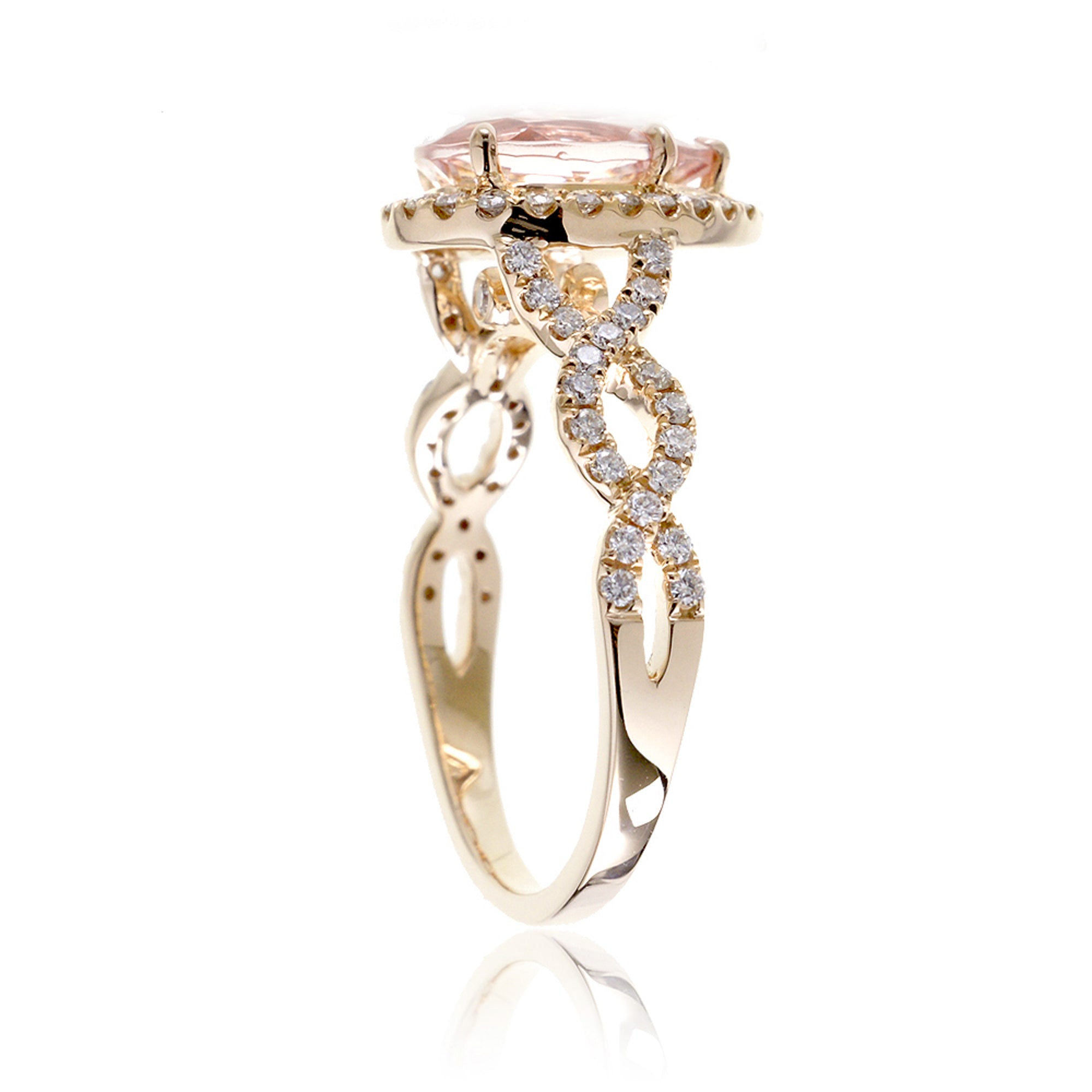 Pear morganite engagement ring yellow gold diamond halo twist band