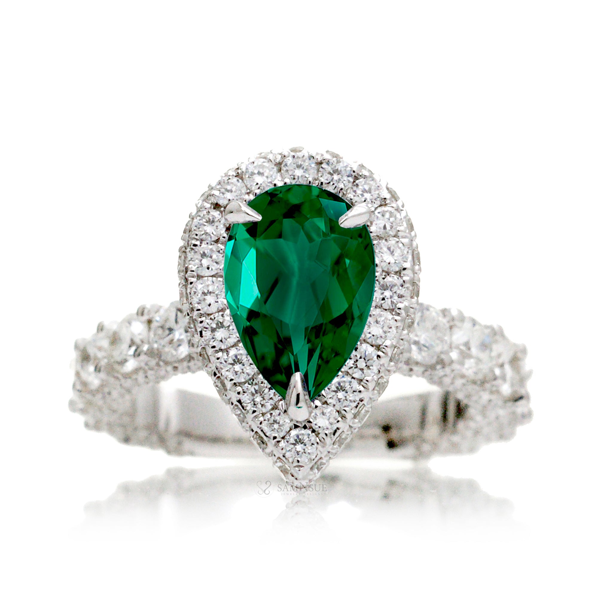 Pear emerald with U prongs diamond halo and band hidden halo in white gold