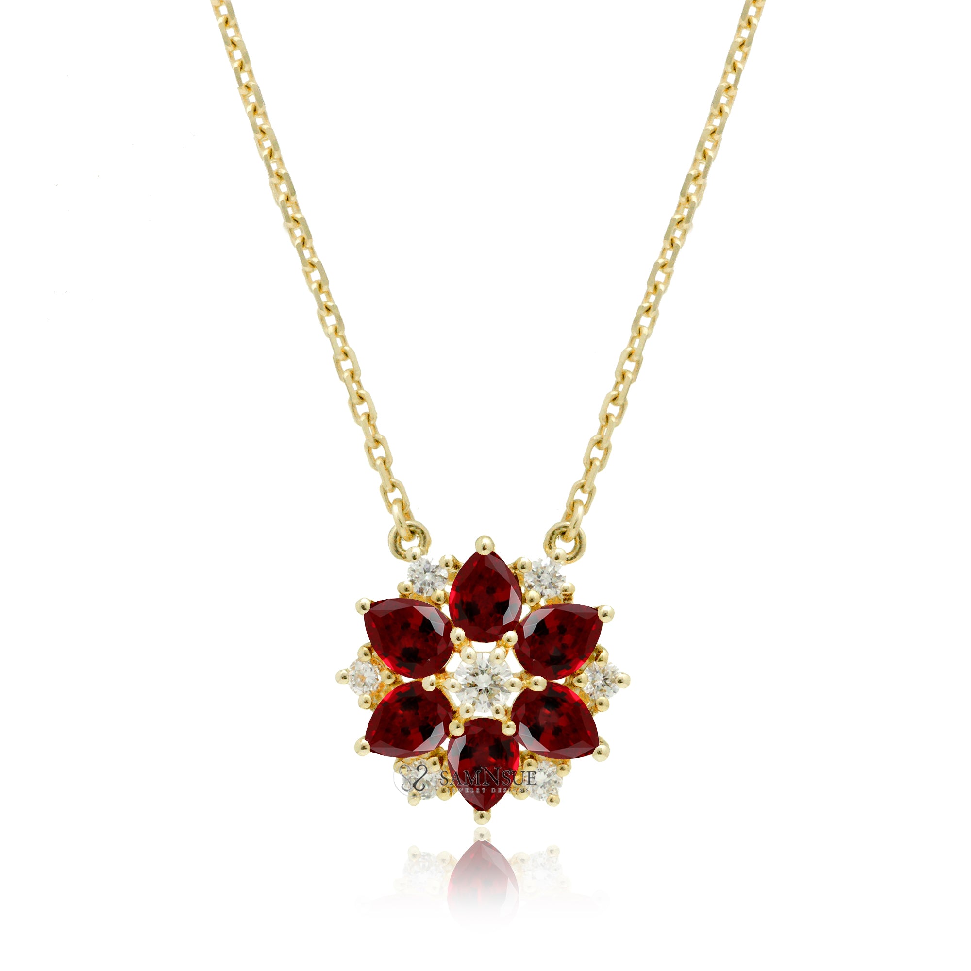 The lotus ruby & diamond star necklace with cable chain in yellow gold