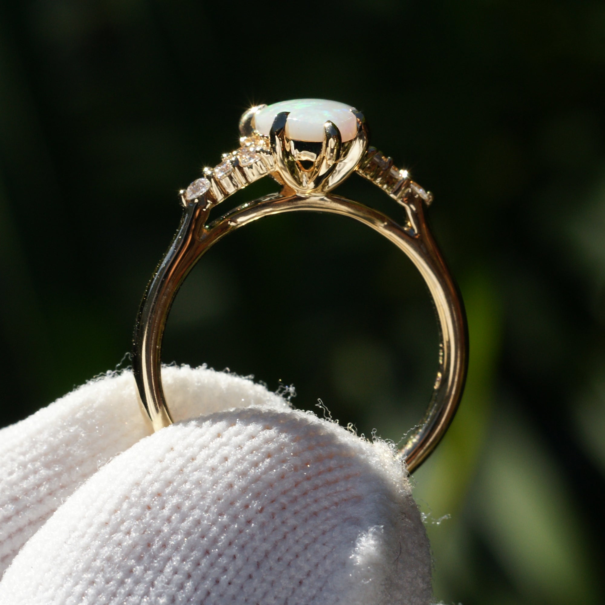 Fiery tear drop opal and diamond three stone ring yellow gold 9x6mm