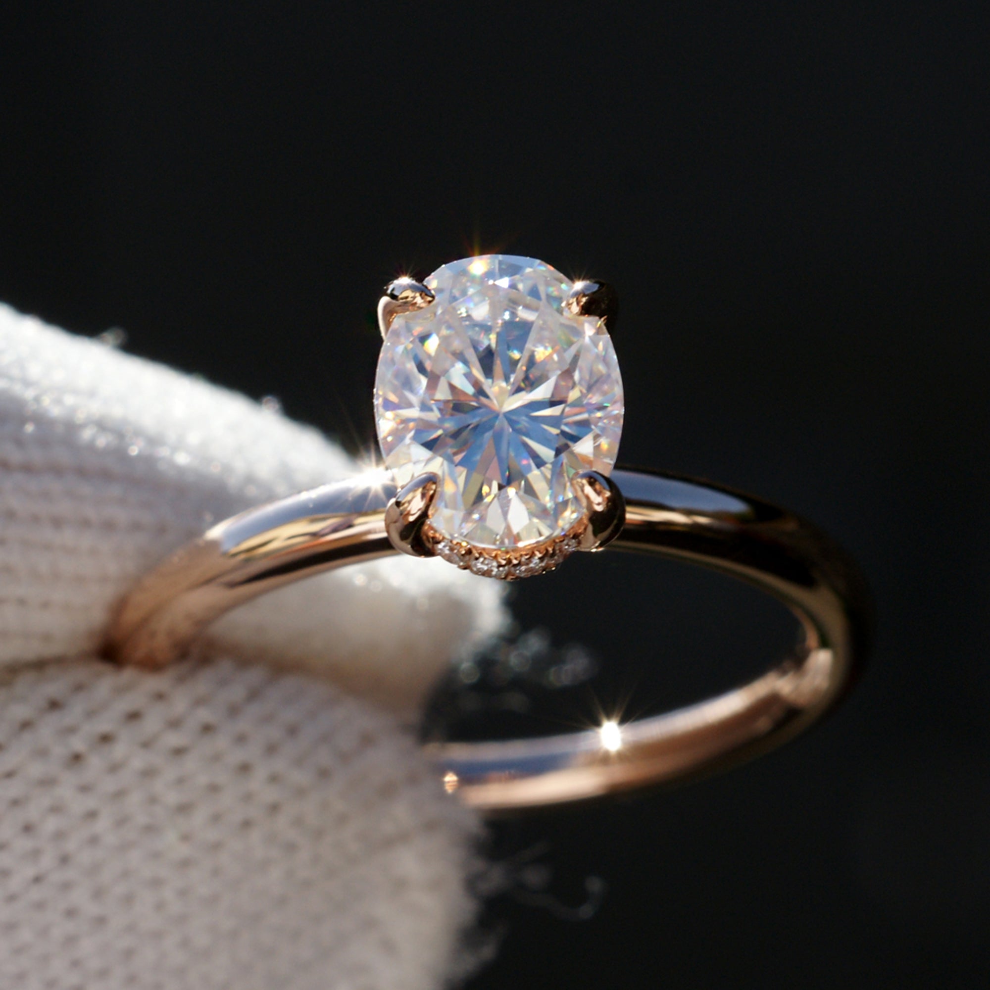 Oval moissanite ring in rose gold with a hidden halo the Lucy from samNsue