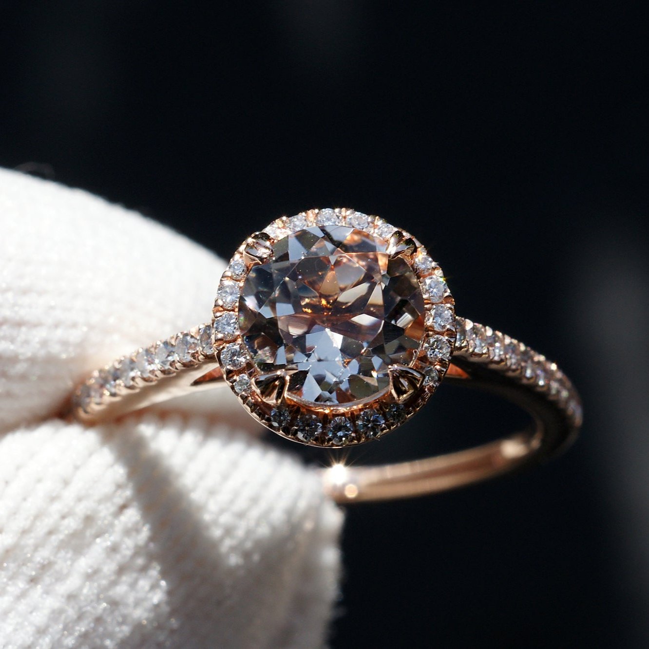 Round morganite engagement ring with diamond halo in rose gold