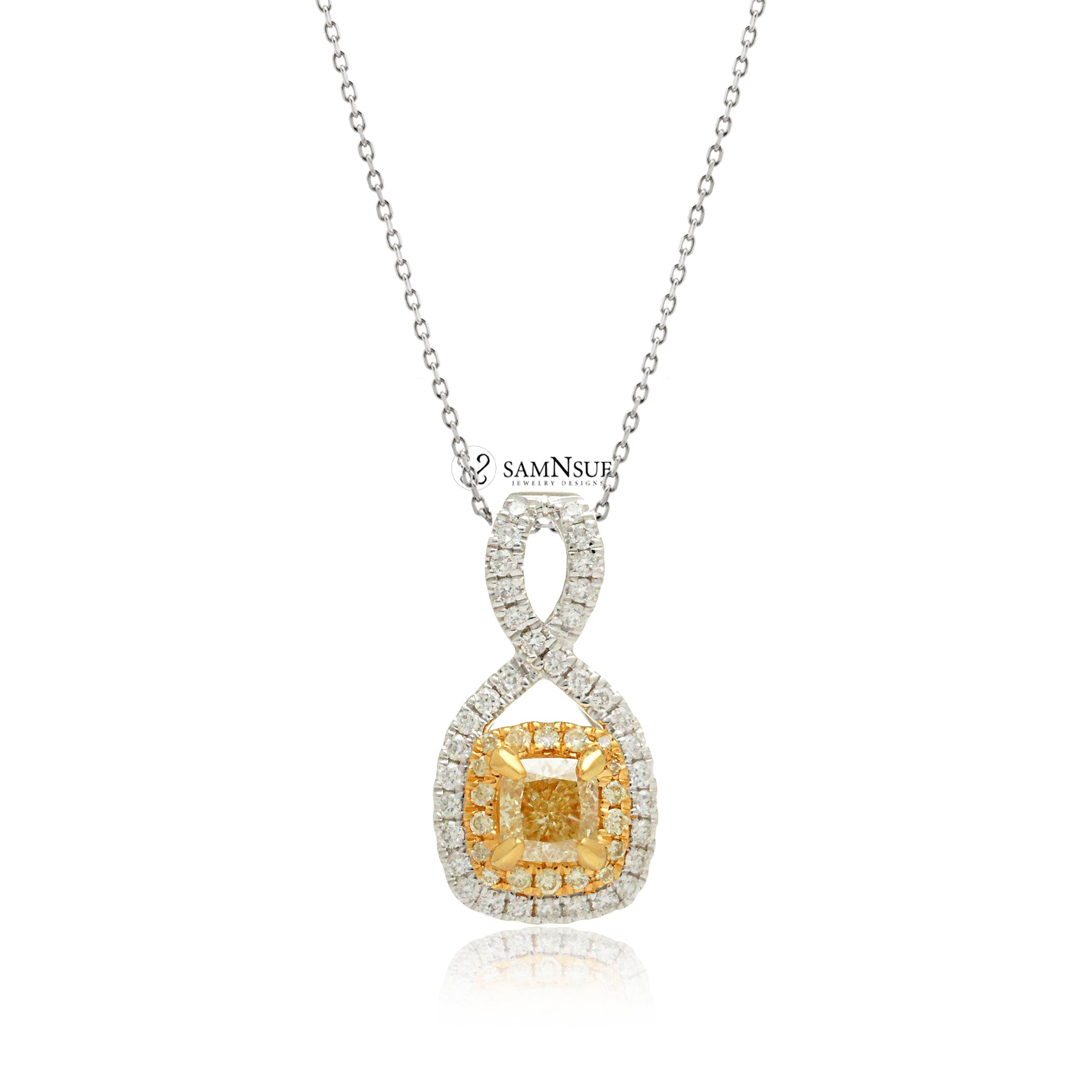 Cushion cut diamond pendant with double halo two tone white gold