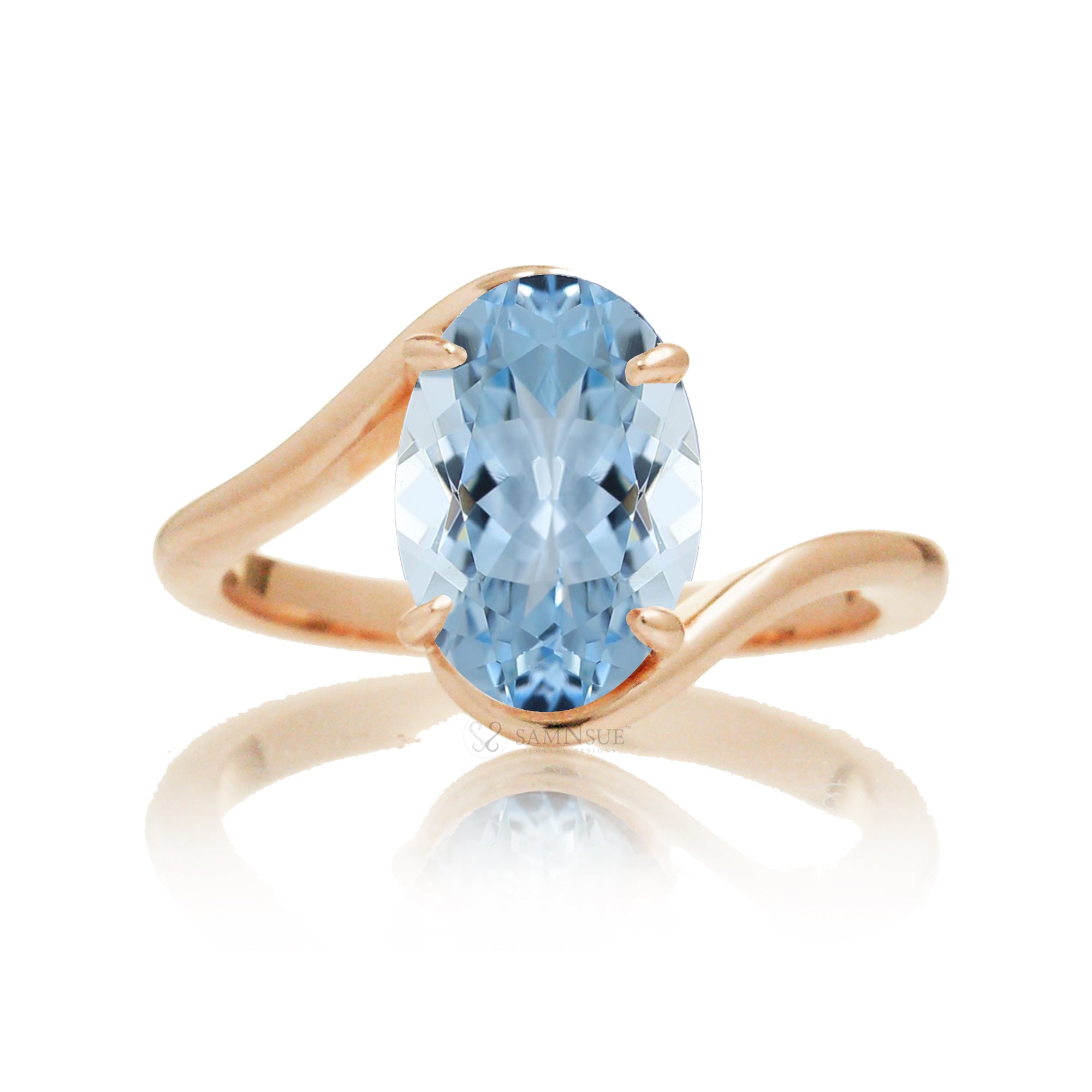 Oval cut aquamarine ring embraced wrap around rose gold solitaire