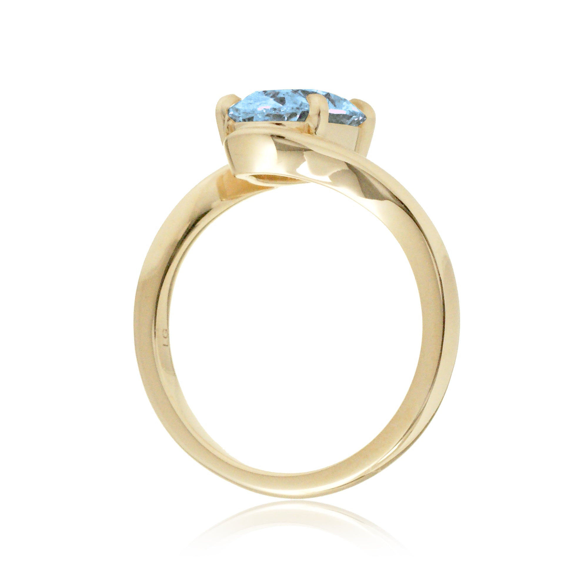 Oval cut aquamarine ring embraced wrap around yellow gold solitaire
