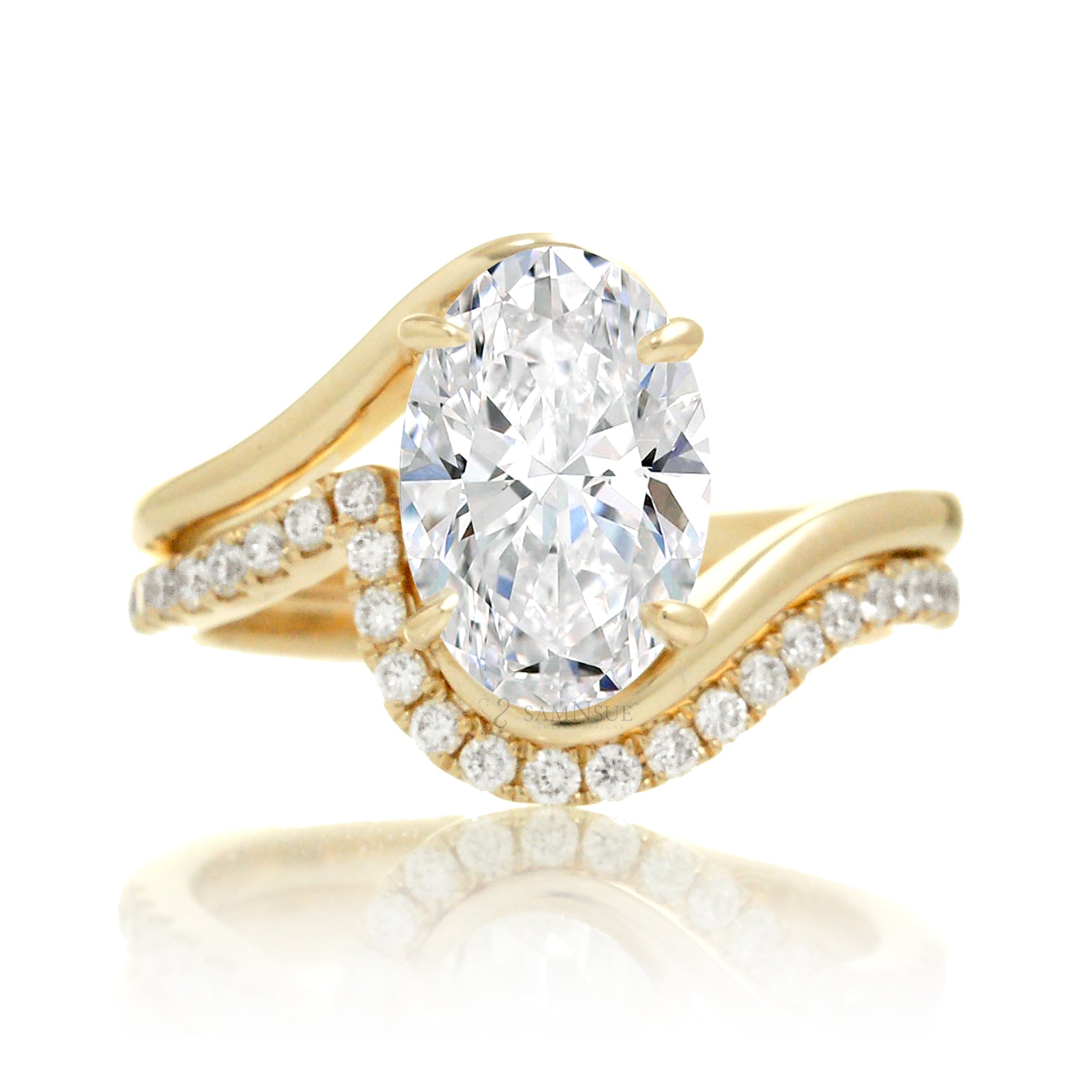 Elegant bypass-style oval diamond ring with polished yellow gold shank