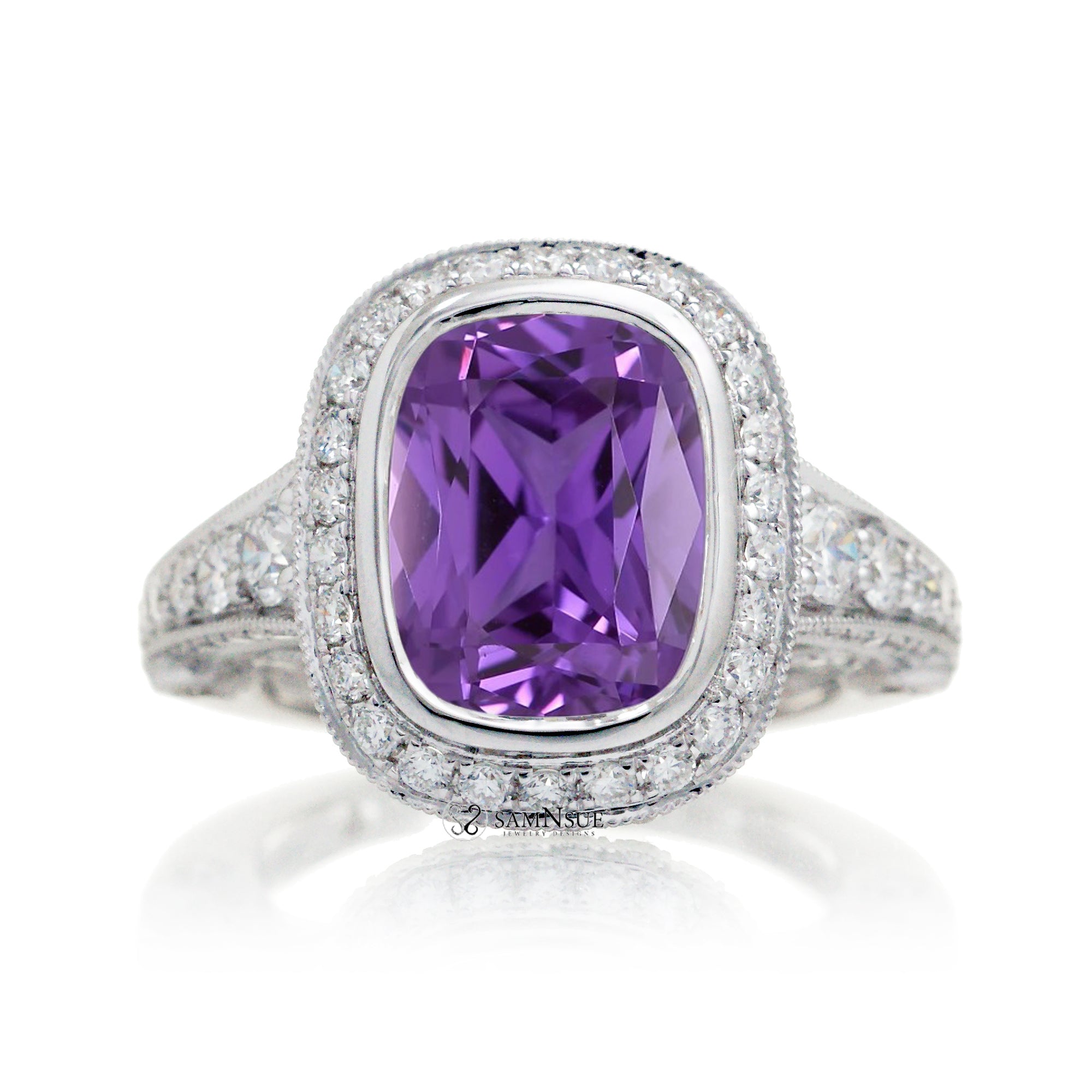 Amethyst diamond statement ring with a cushion cut antique style halo