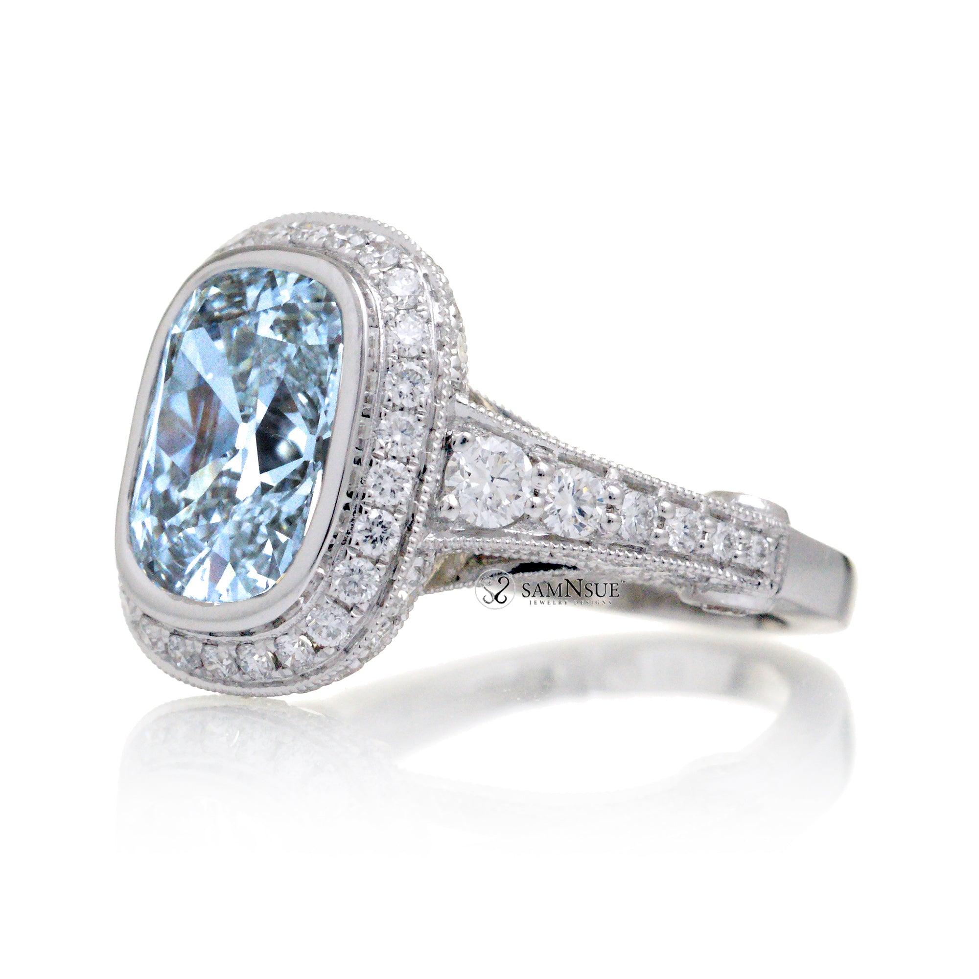 Cushion cut aquamarine bezel set vintage style engagement ring